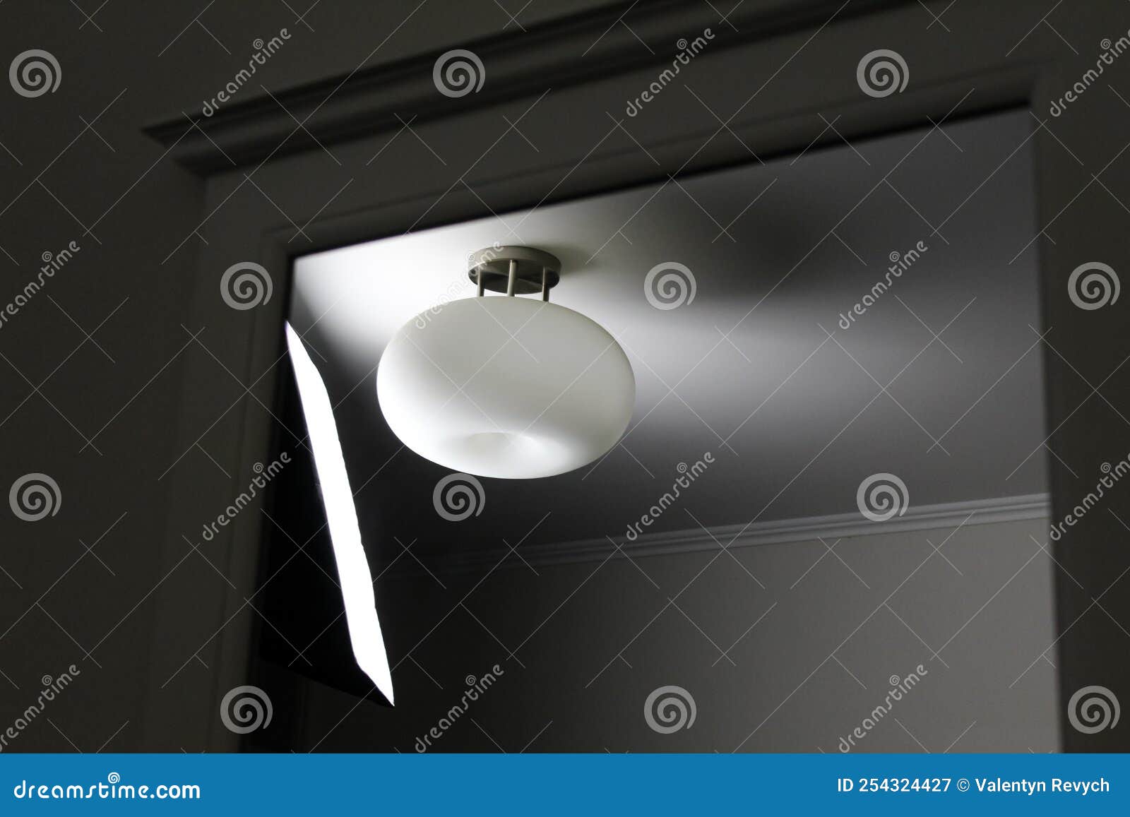 Light bulb on a wall stock image. Image of black, glass 254324427