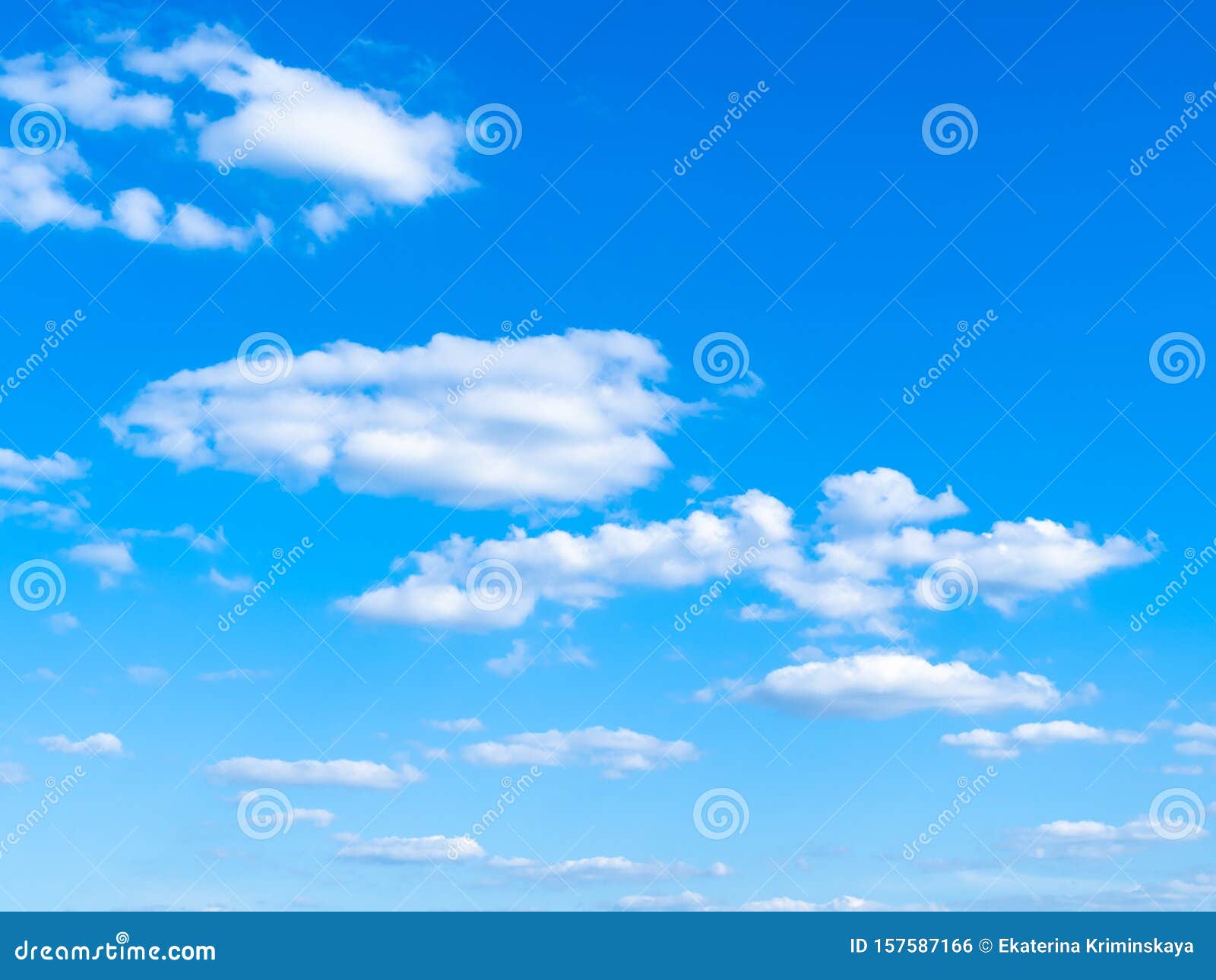 light cumuli clouds in blue sky on sunny day