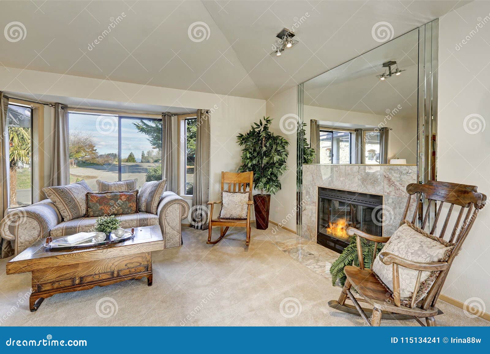 Light Filled Family Room With Vaulted Ceiling Stock Image