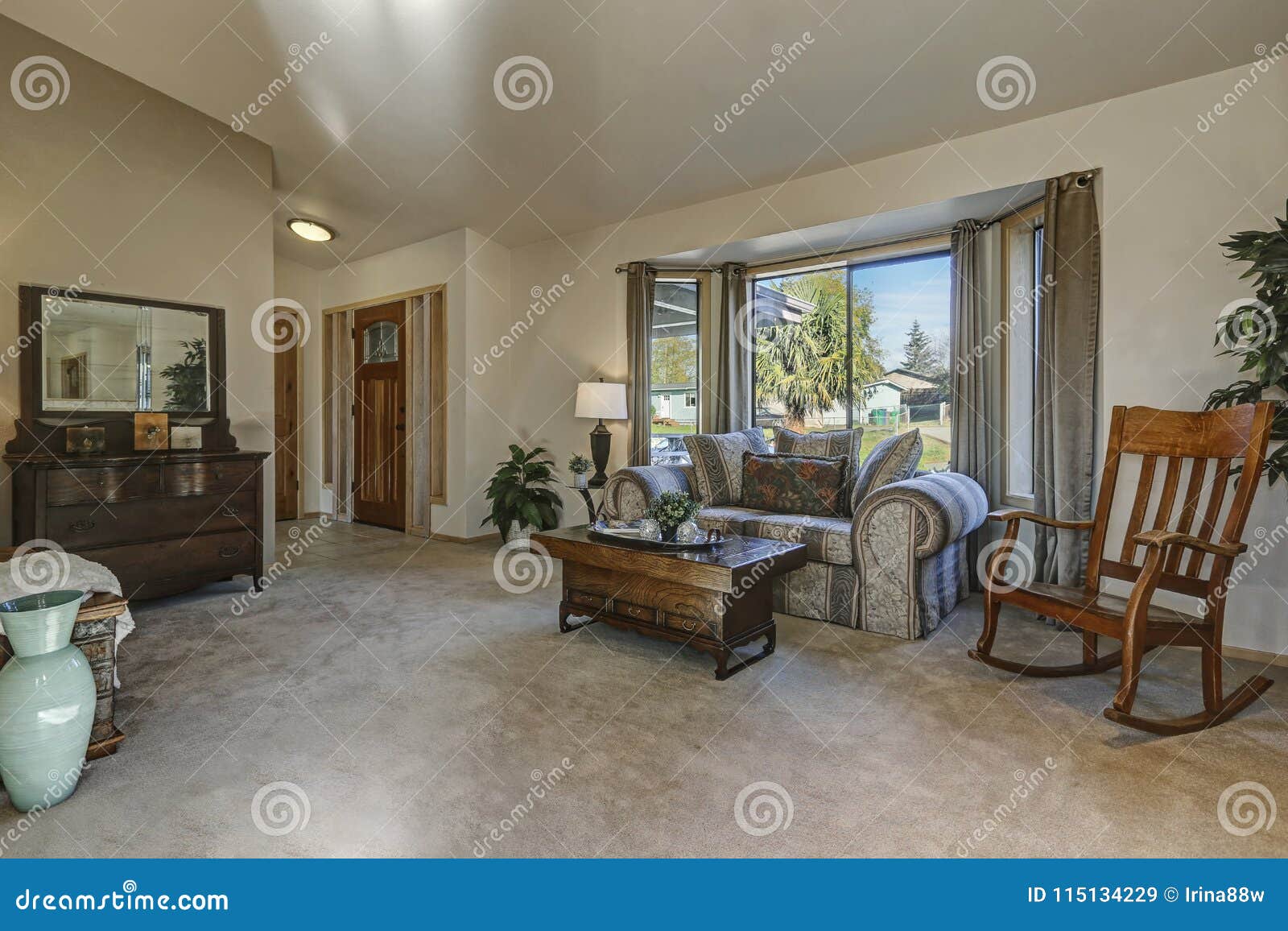 Light Filled Family Room With Vaulted Ceiling Stock Image