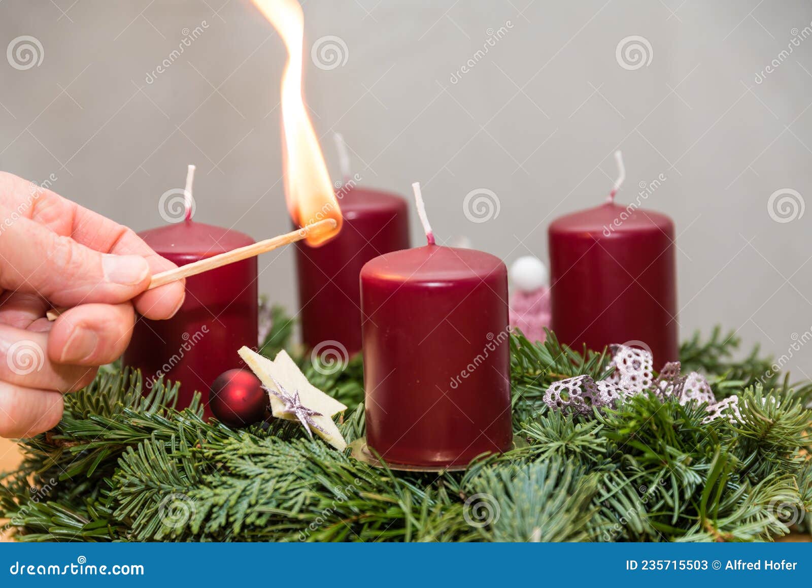 Light the First Candle on the Advent Wreath Stock Image Image of