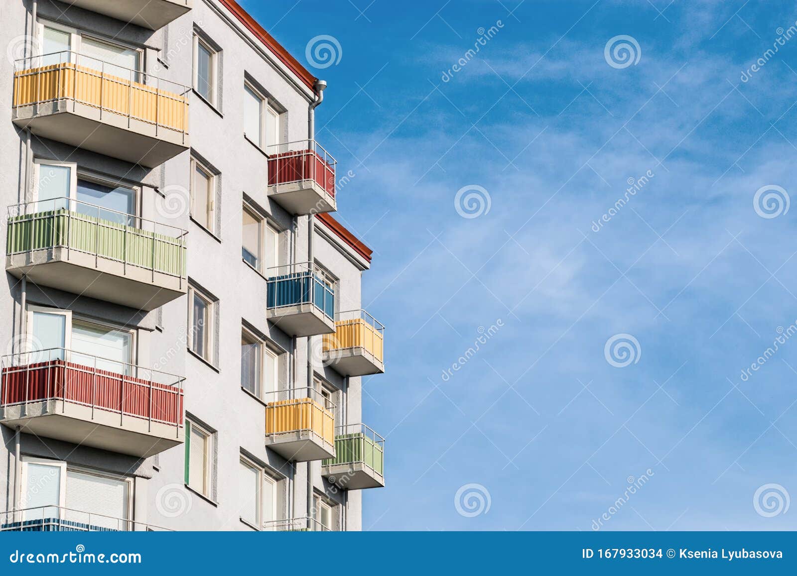 Colorful Building and Bright Blue Sky Poster