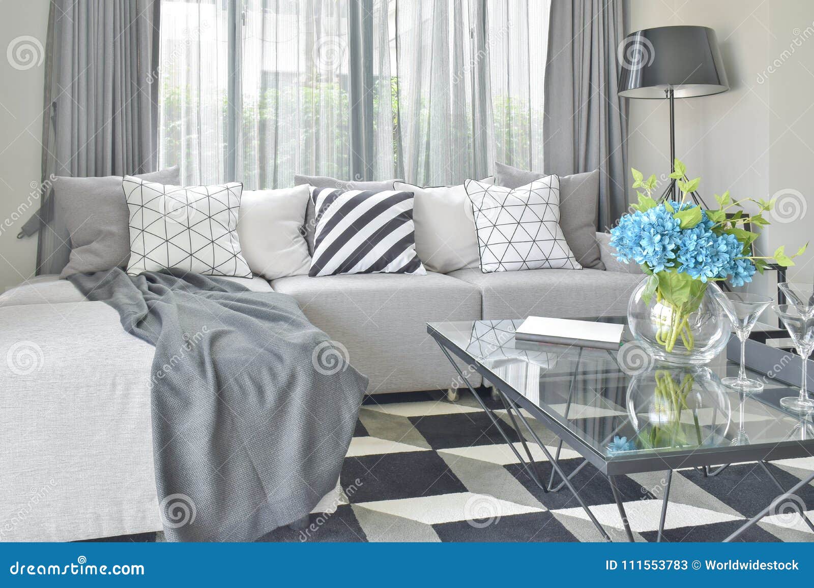 Light Gray L Shape Sofa Set with Varies Pattern and Color Pillows in