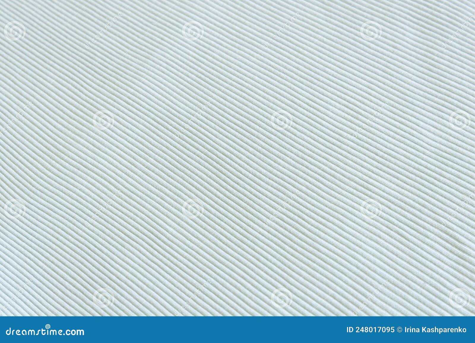 Light green, blue, mint show texture of ribbed cotton fabric wave. Close  up. Cotton clothing and textiles. Natural organic fabrics texture light  Stock Photo