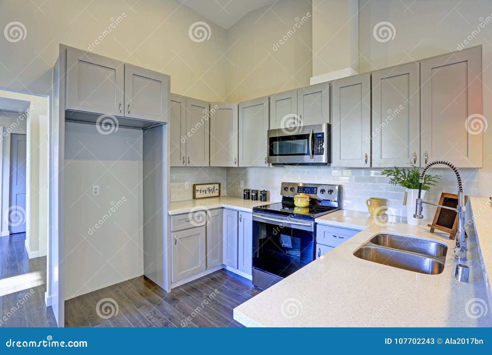 Light Grey Kitchen Room Interior With Vaulted Ceiling Stock Image