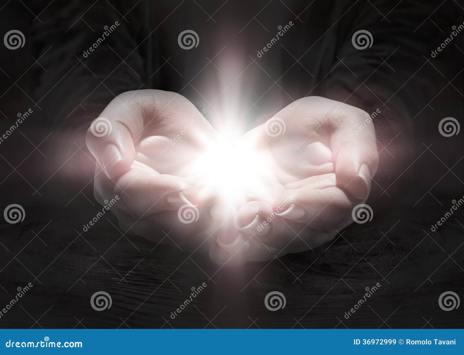 light in hands - pray the crucifix