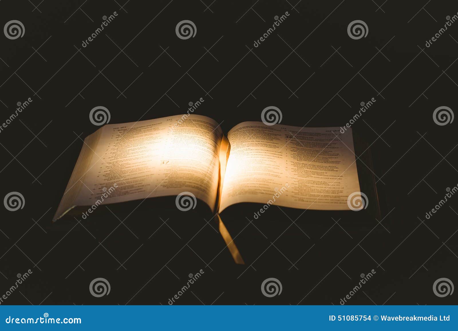 light shining on open bible
