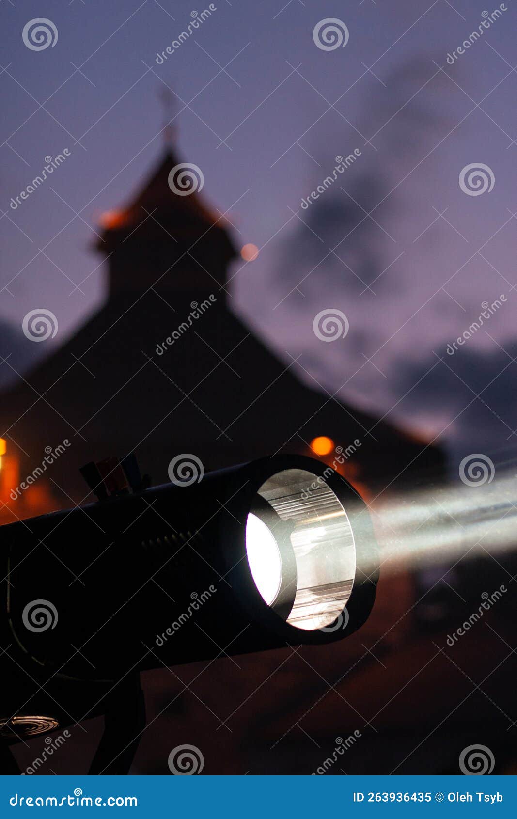 Light Spotlight, at a Concert from the Stage on the Background of a