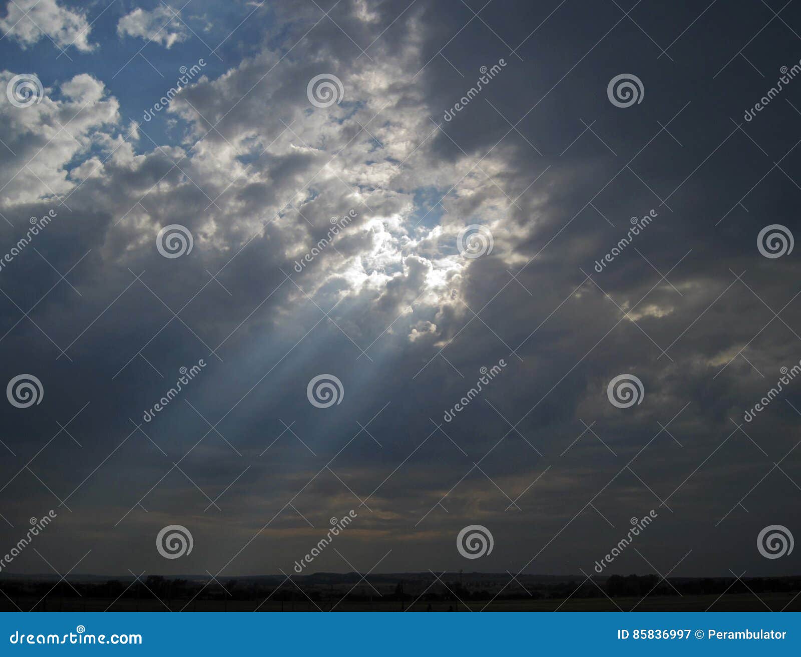light streaming through clouds