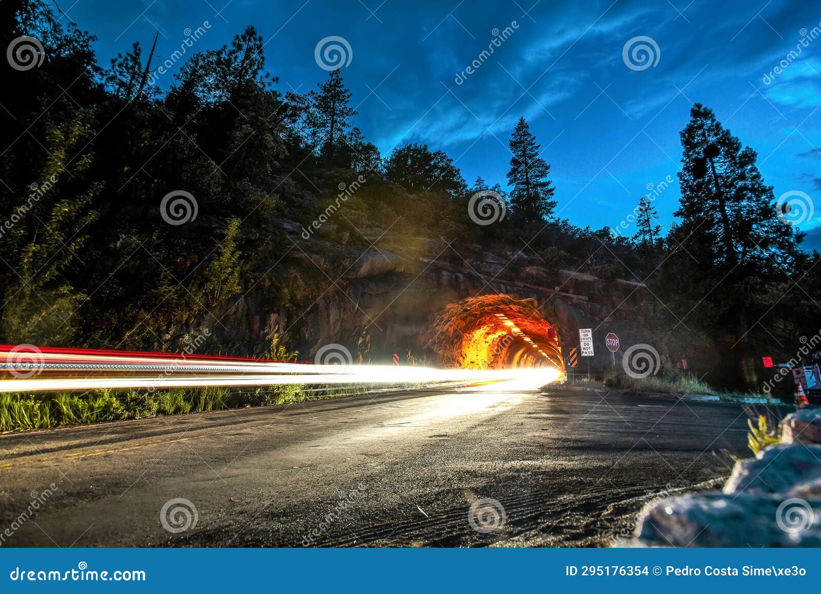 light trails by wawona tunnel at night - yosemite national park, california