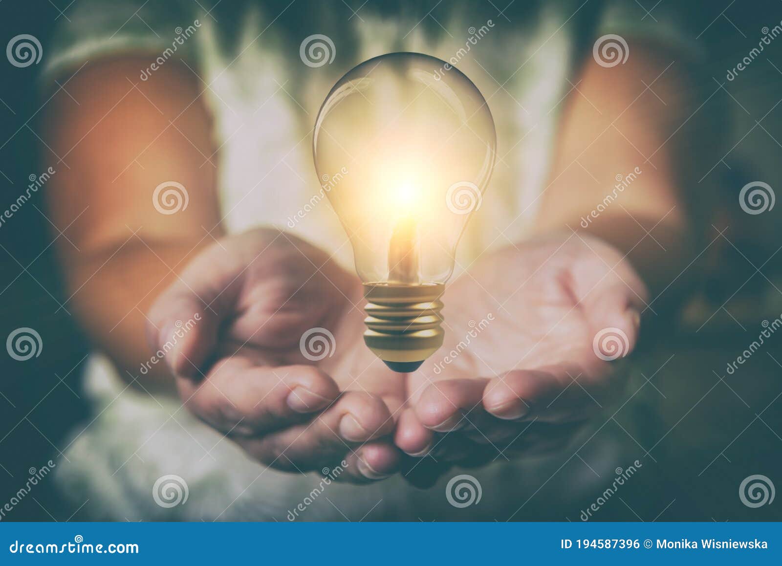 lightbulb floating over wonan`s hands