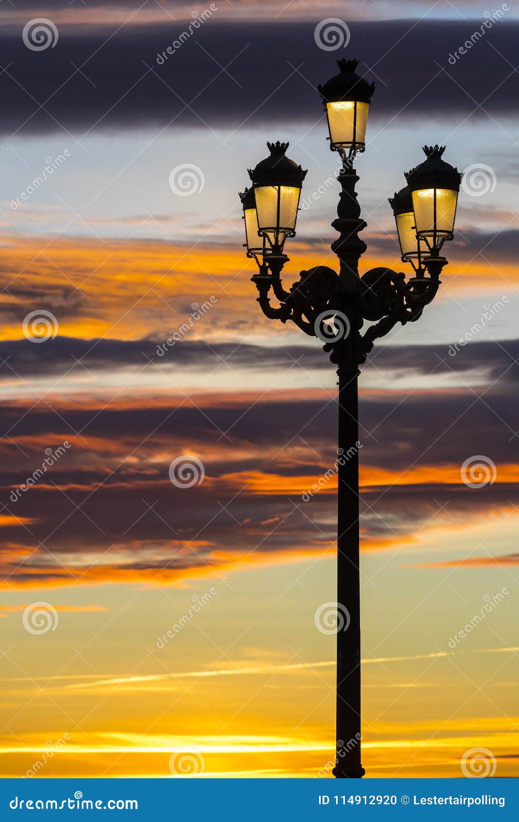 Lighted Lanterns Against the Backdrop of the Setting Sun on the Streets