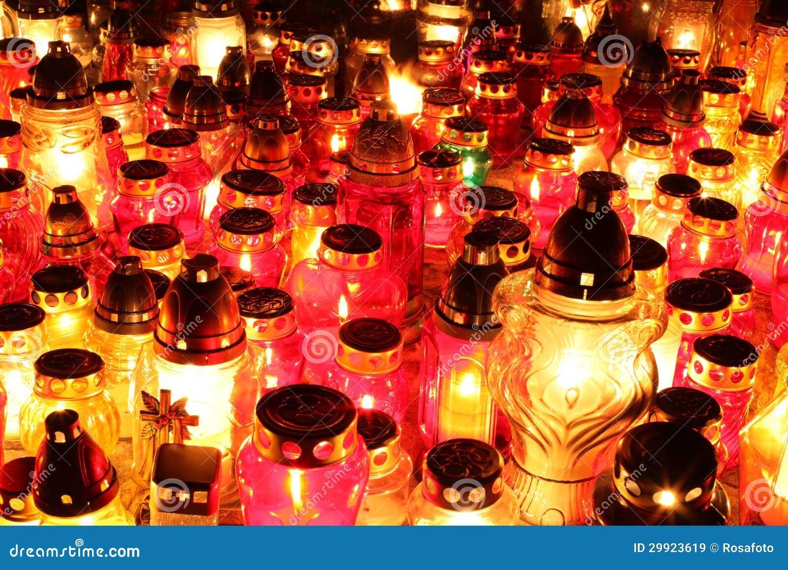 Lighted cemetery candles stock image. Image of candle 29923619