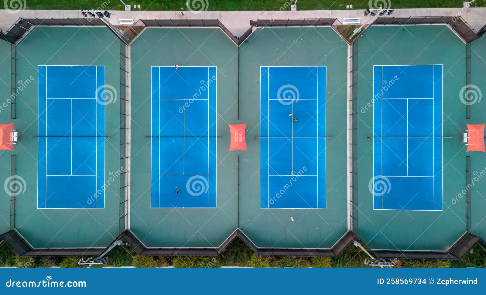 lighted tennis courts grouped together