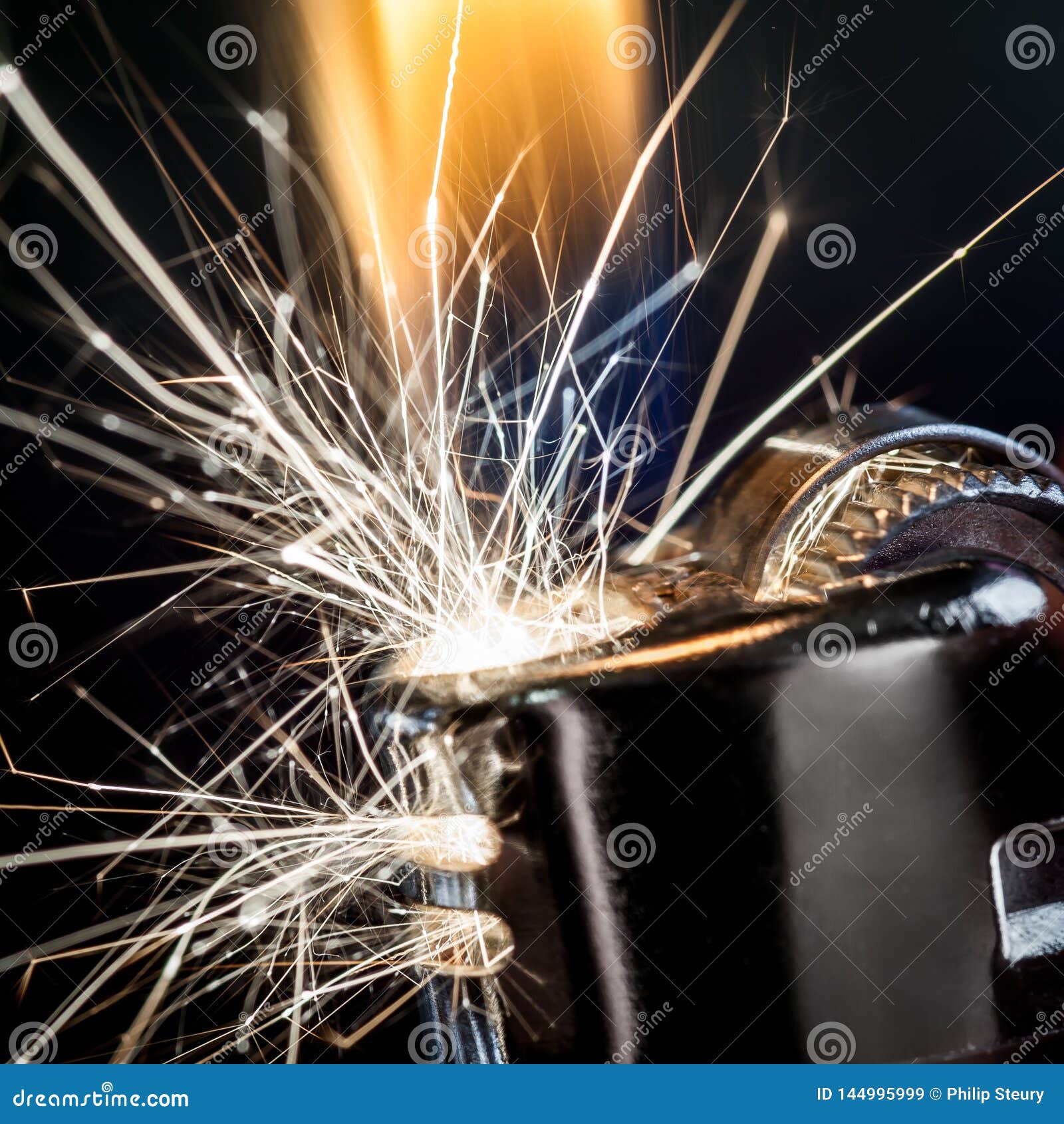 lighter igniting sparks