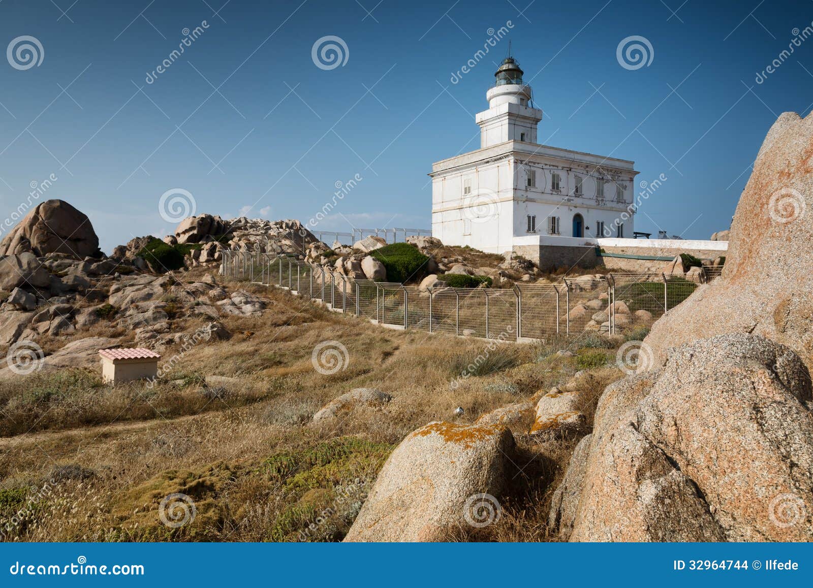 lighthouse at the capo testa, sardinia, italy