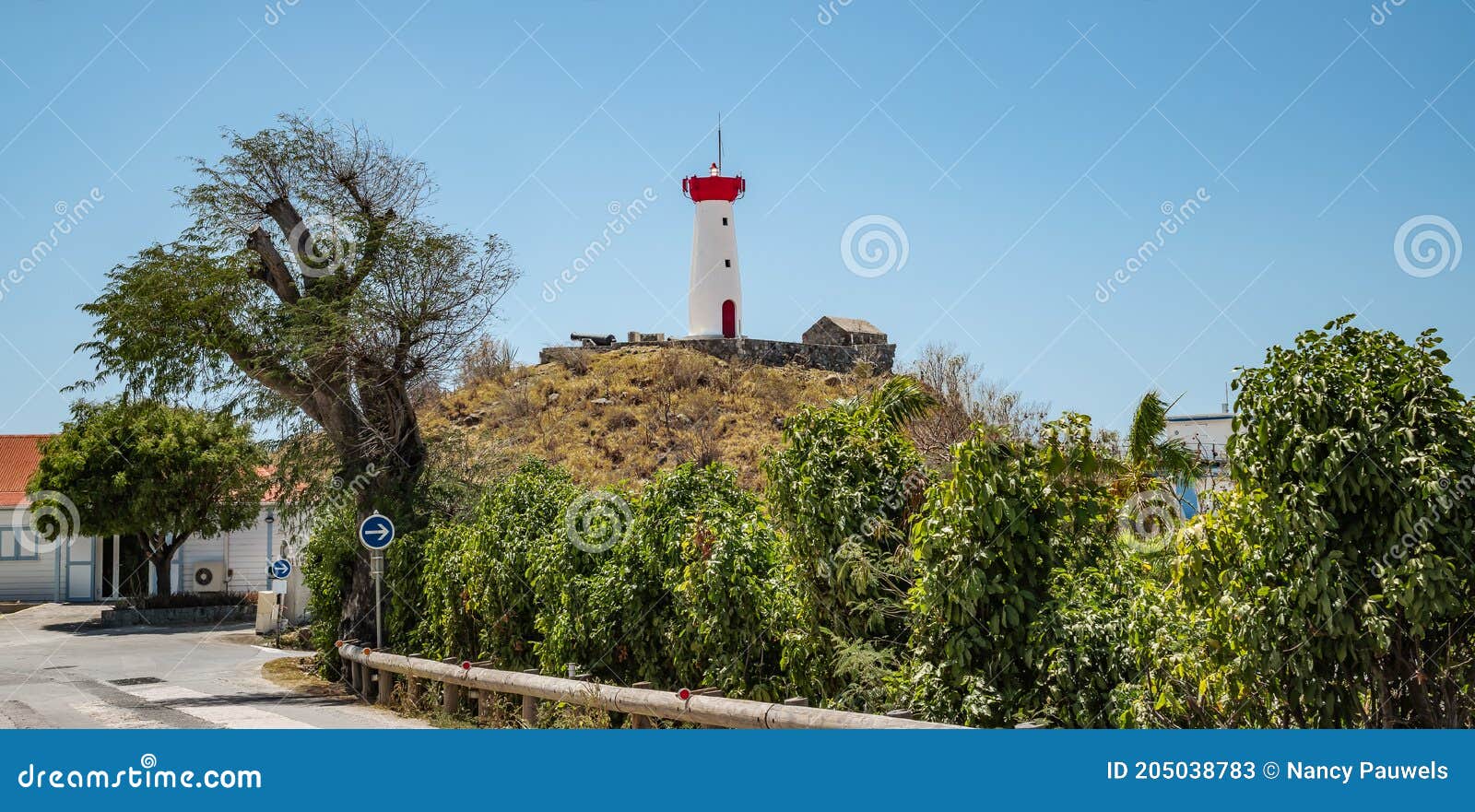 lighthouse on the hill at the harbor of gustavia in st barts saint barthelemy.