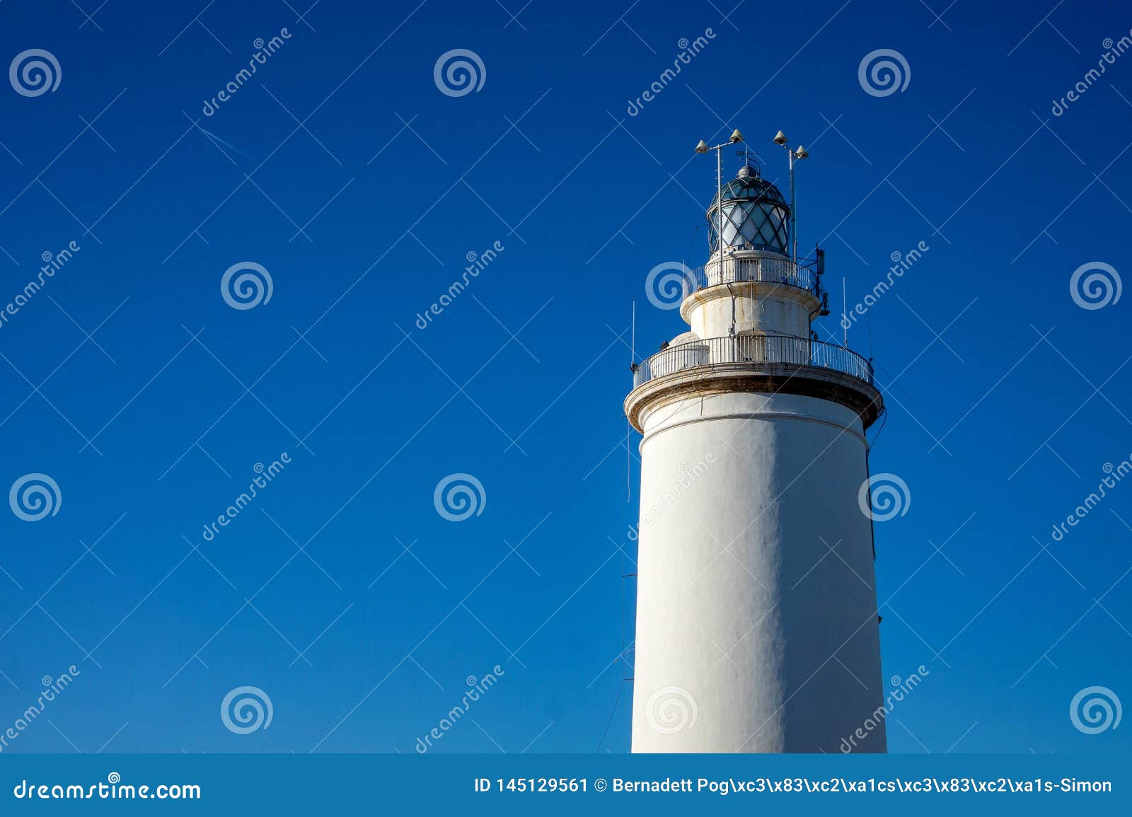lighthouse la farola de malaga in malaga city. andalusia, costa del sol, spain