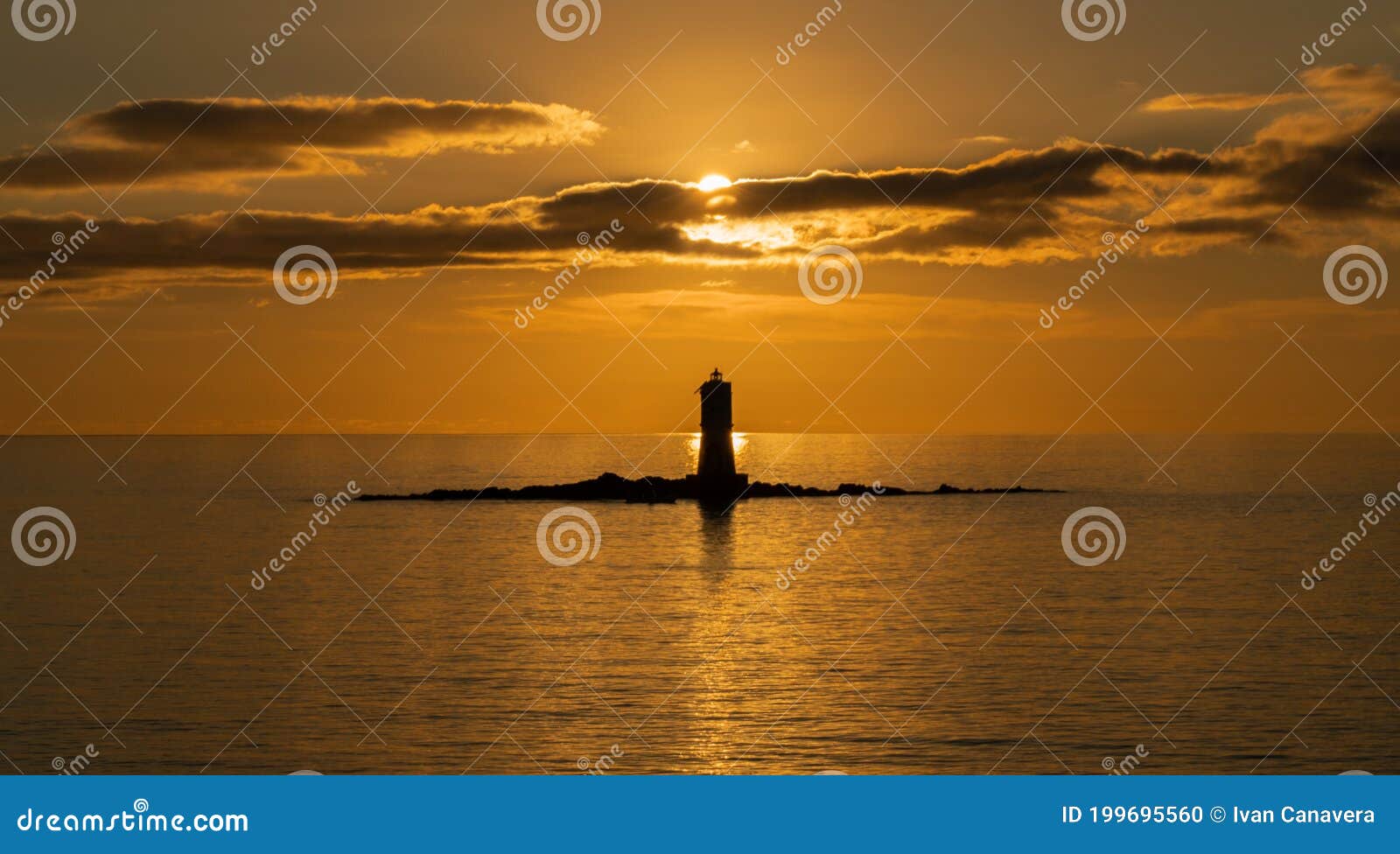 the lighthouse of the mangiabarche on a serene sunset,autumn day
