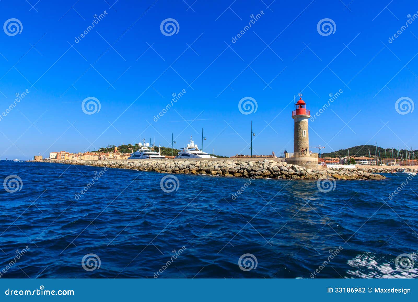 lighthouse at the sea port of saint - tropez, cote