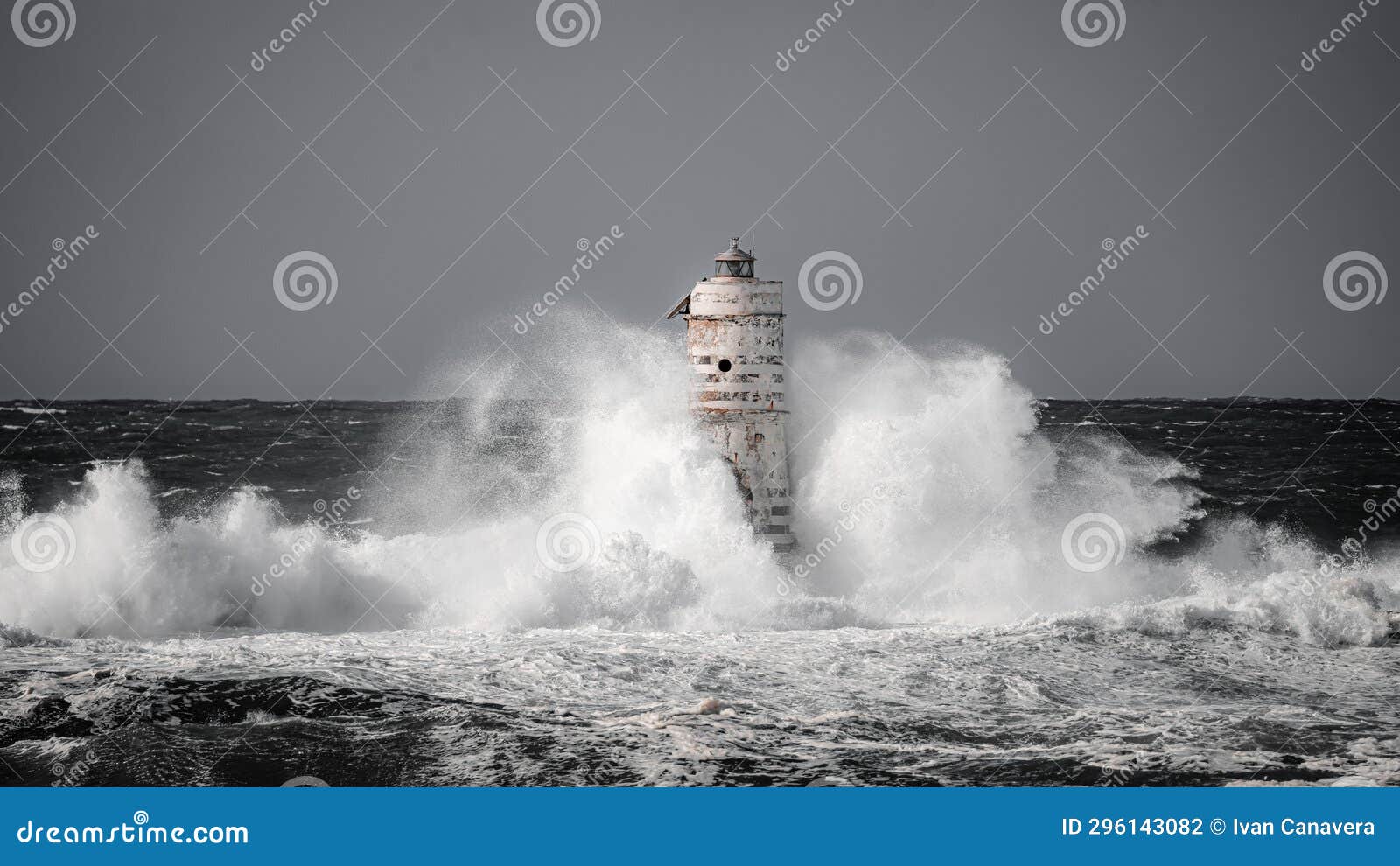 lighthouse storm - mangiabarche lighthouse during a winter swell