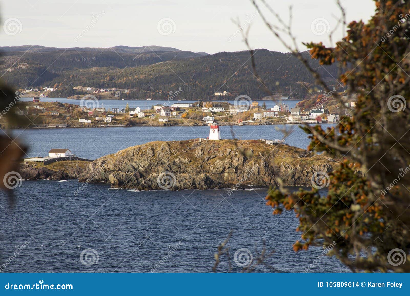 lighthouse in trinity bay from skerwink coastline trail, trinity