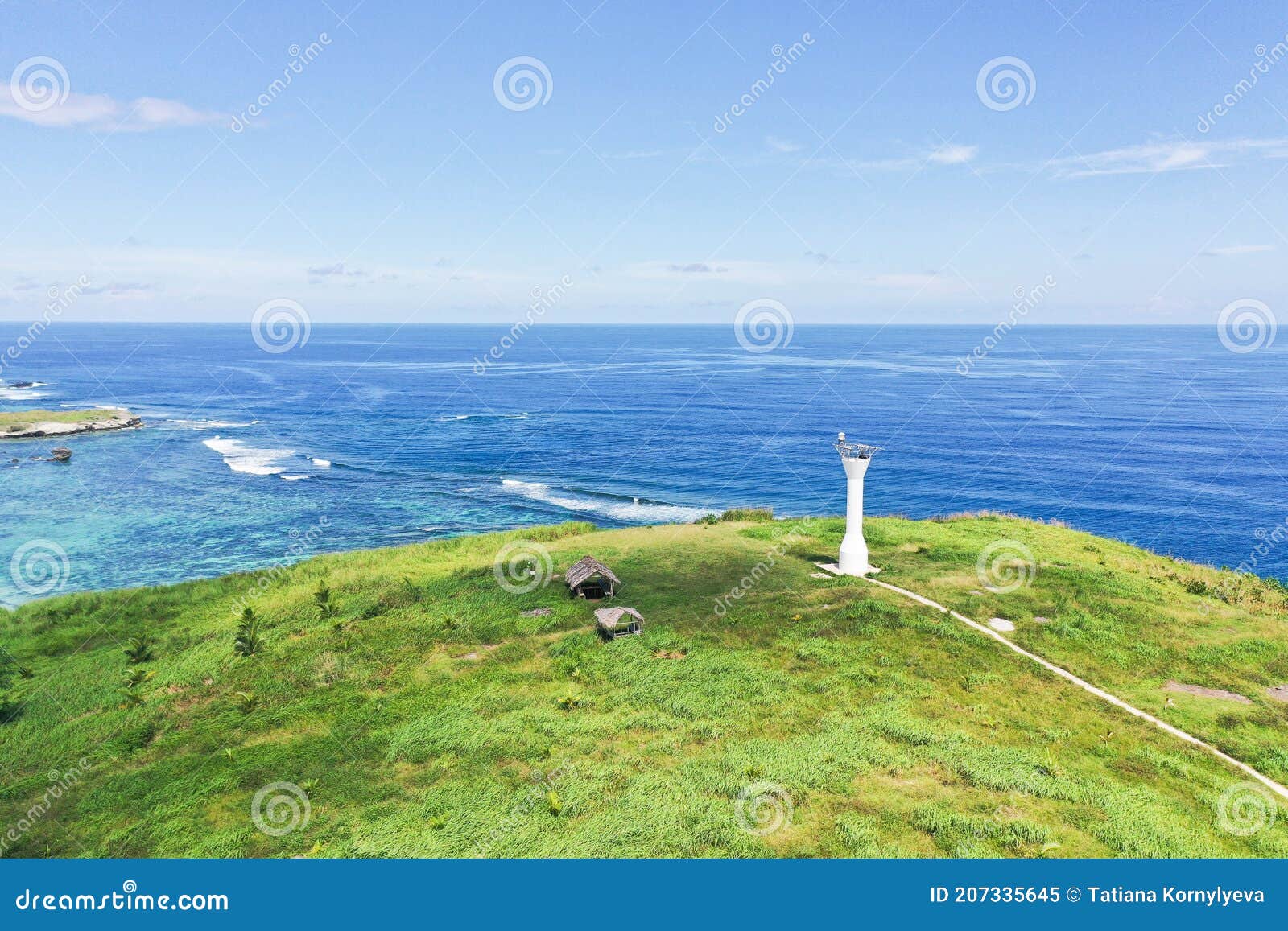lighthouse on a tropical island, top view. basot island, caramoan, camarines sur, philippines