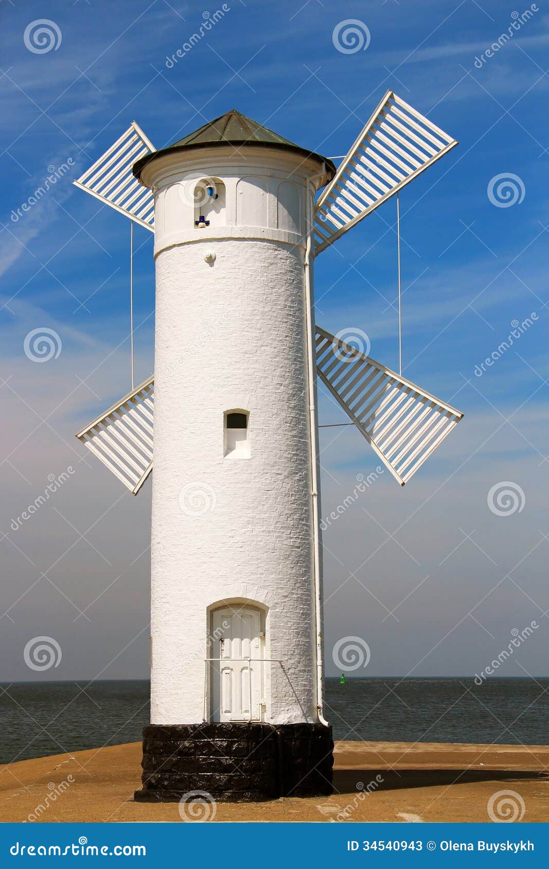 lighthouse windmill in swinoujscie, poland