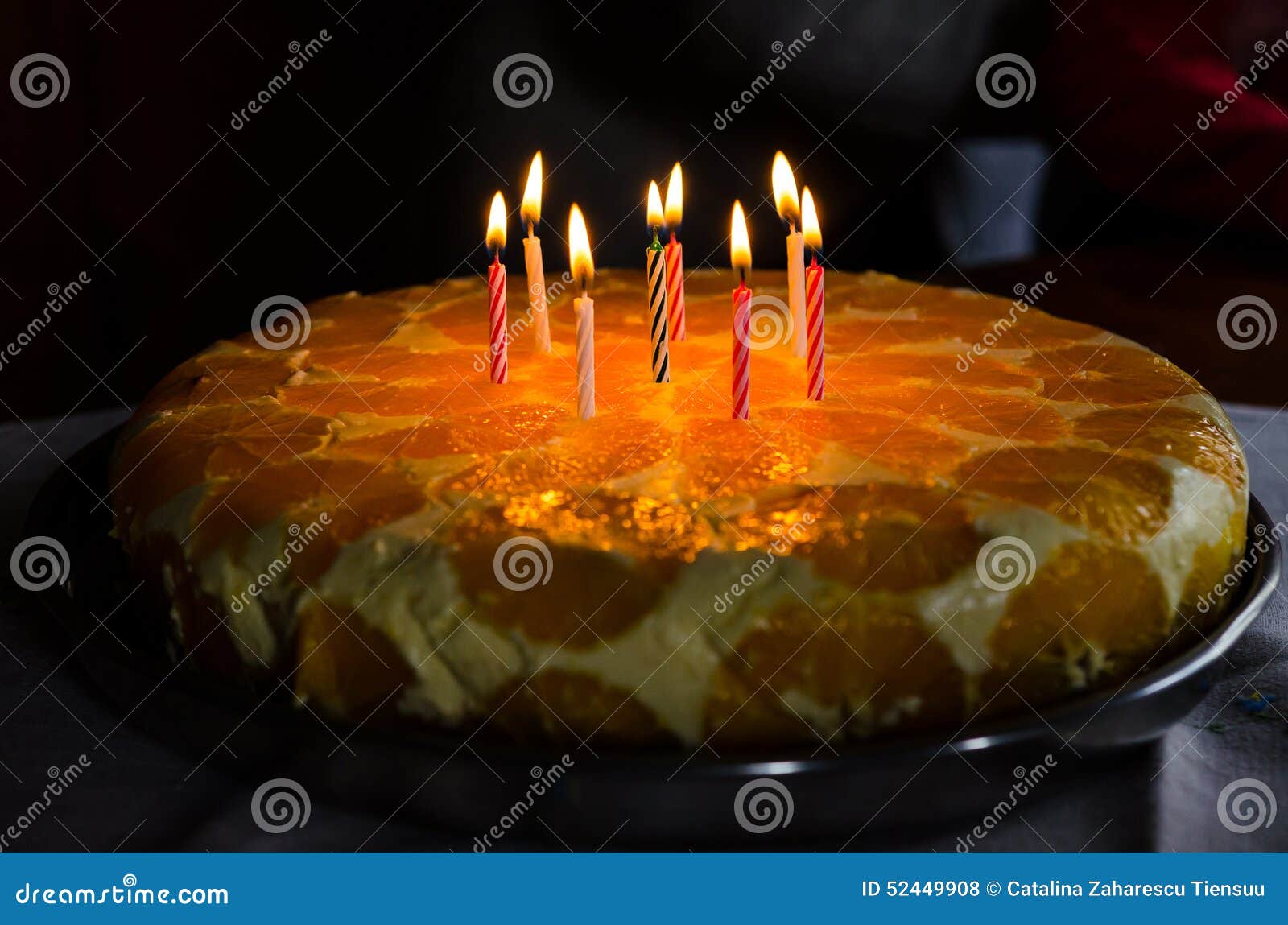 Lighting Candles on a Birthday Cake Stock Photo Image of oranges