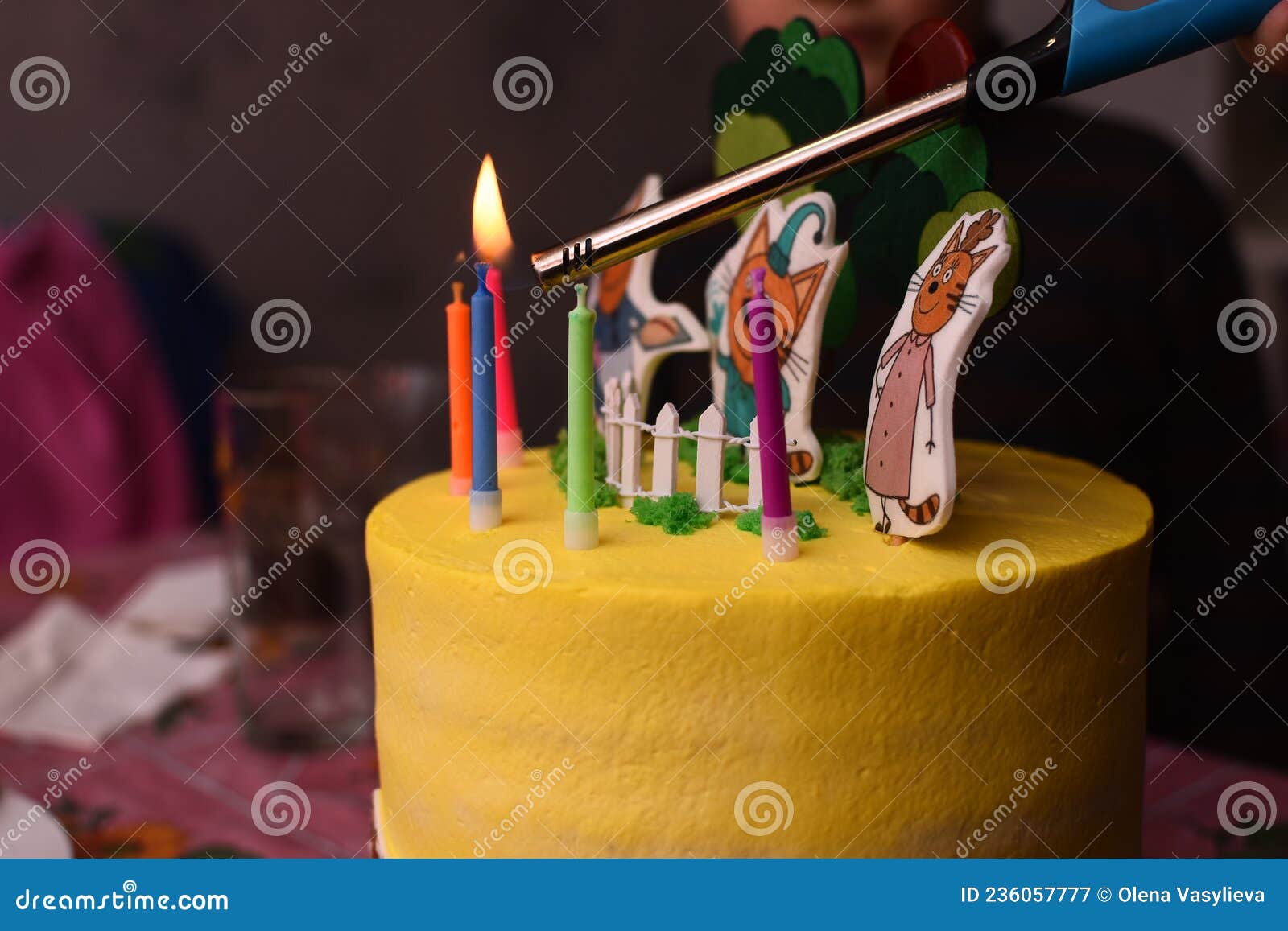 Lighting Candles on a Cake with a Lighter. Stock Image Image of