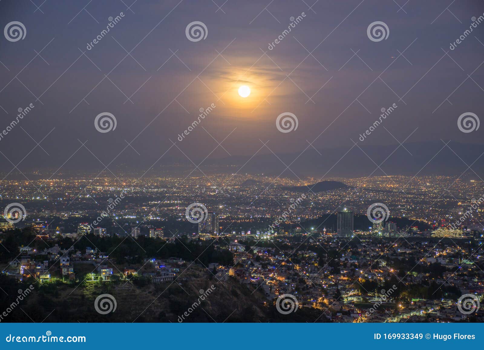 lighting the city with a full moon