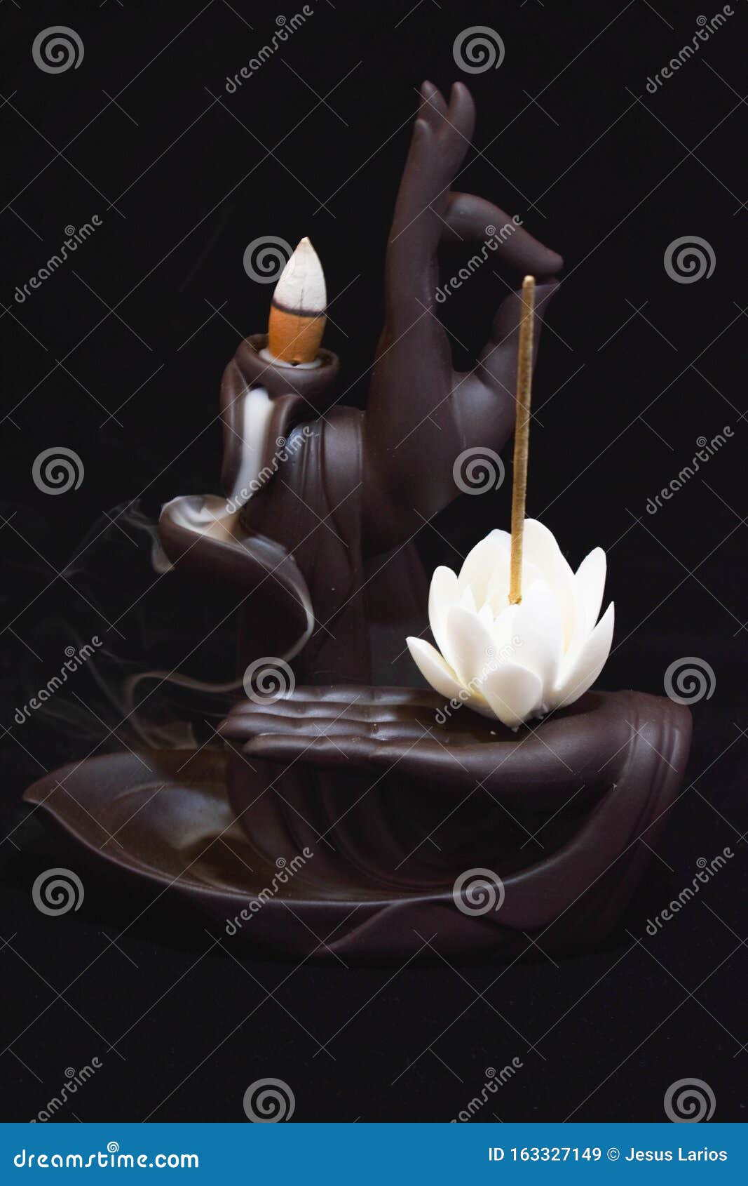 burning incense on black background in zen figure