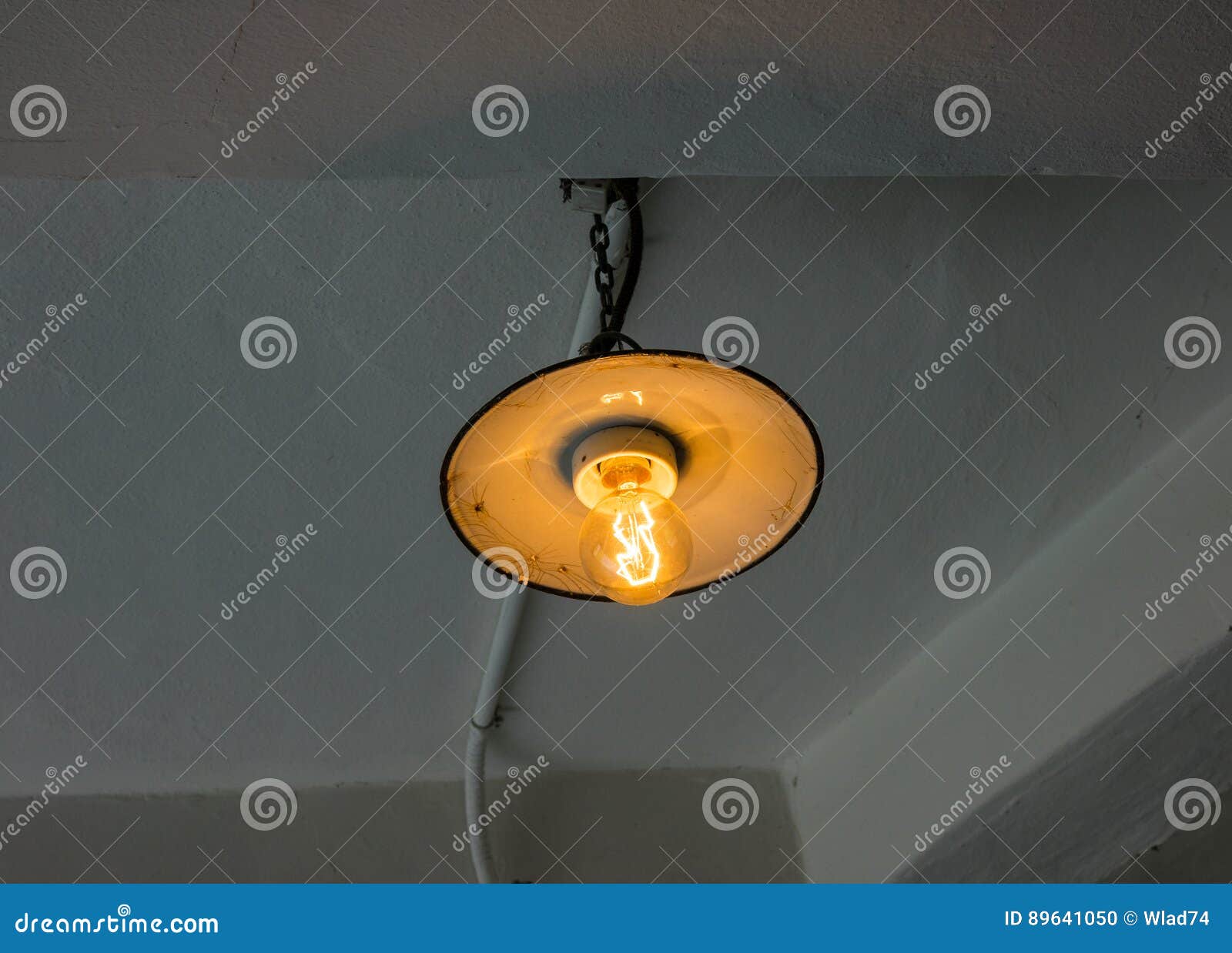 Lighting Light Bulb on the Cable in Dark Room Stock Photo Image of