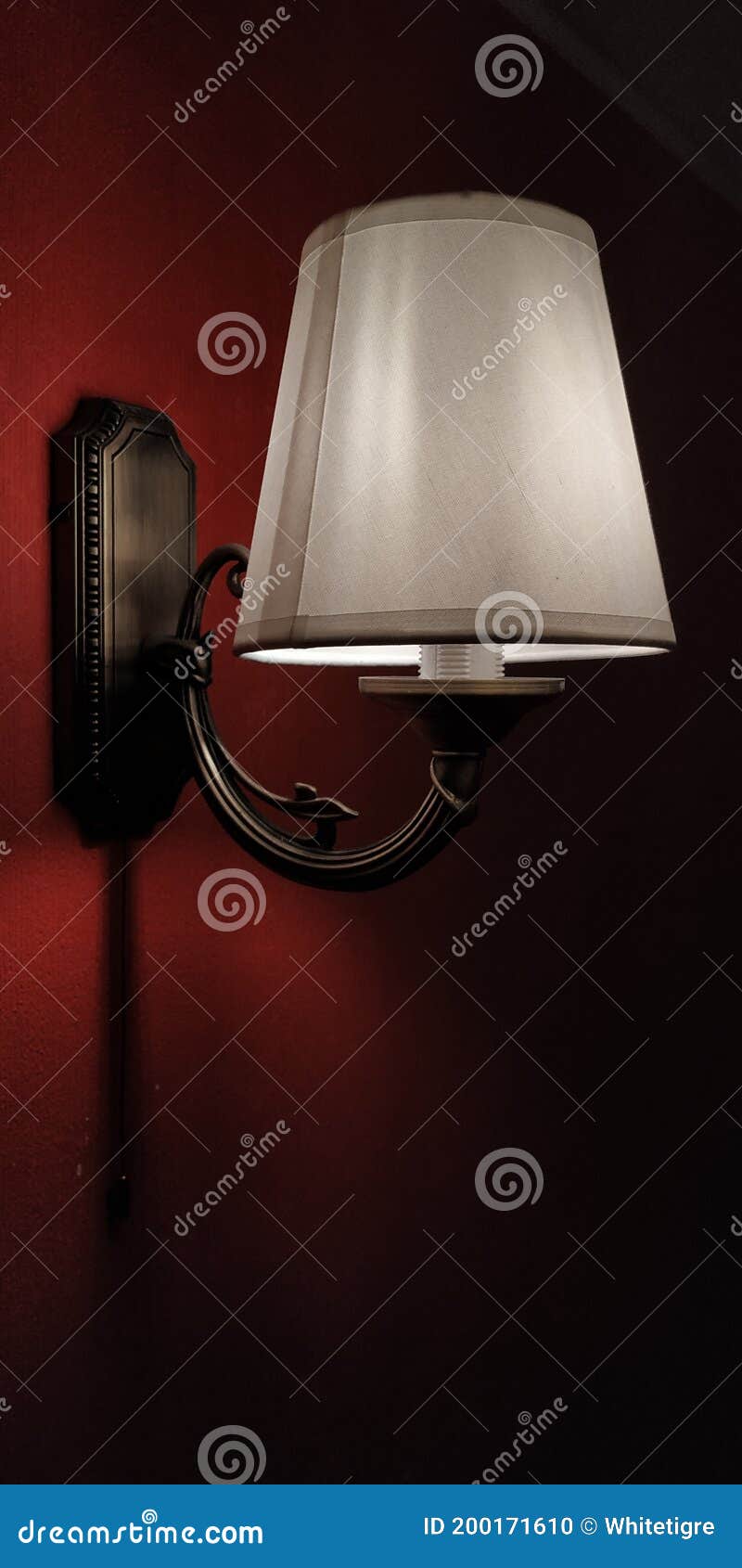 Lighting on red wall stock photo. Image of lamp, furniture 200171610