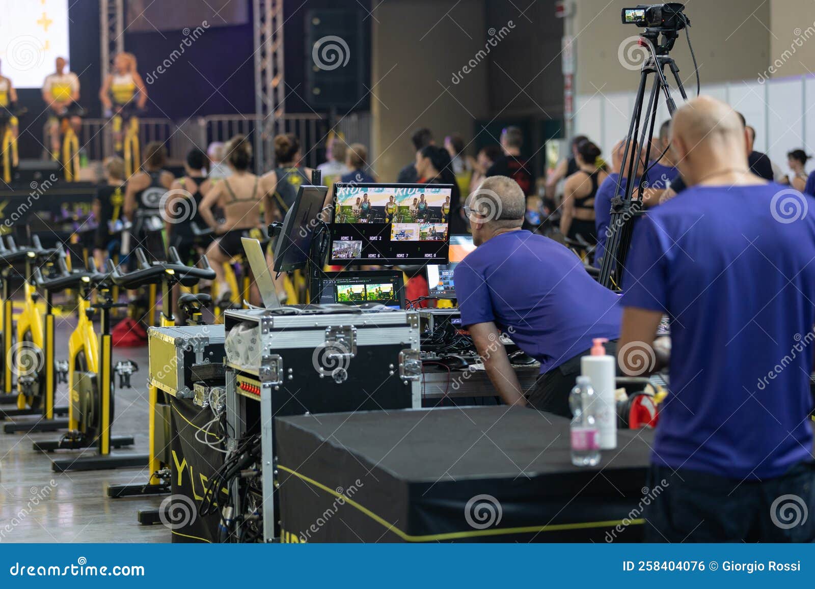 Lighting and Sound Technician and Broadcast Operator at Work in the