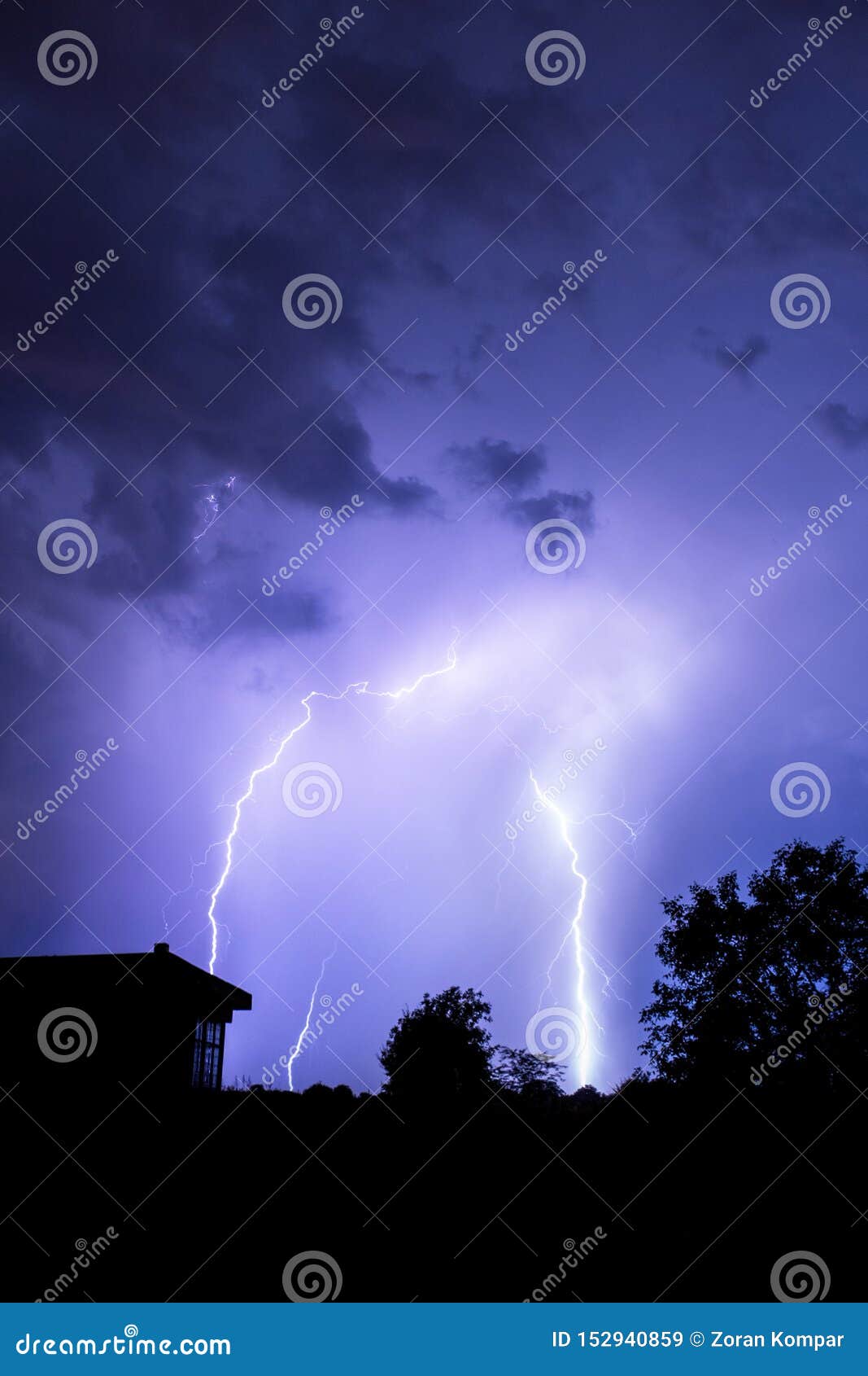 Lightning Flashes Over the Night Sky during Thunderstorm Stock Image
