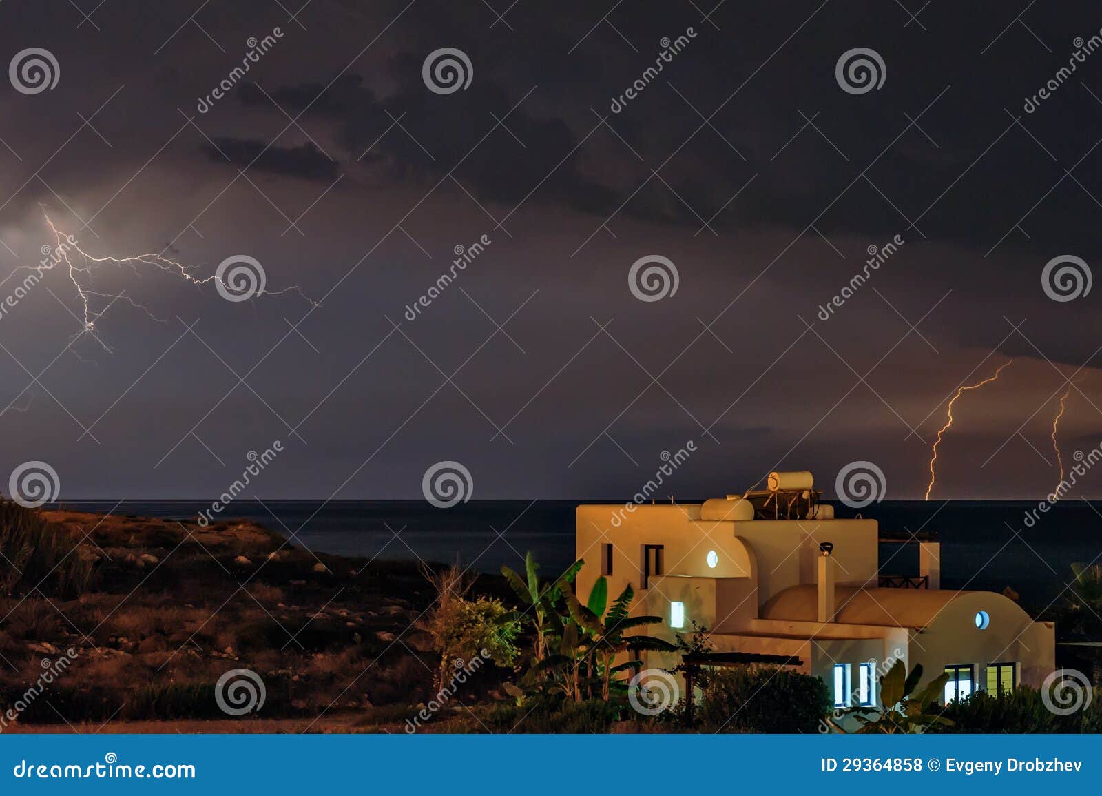 Lightning over beach house stock photo. Image of palm 29364858