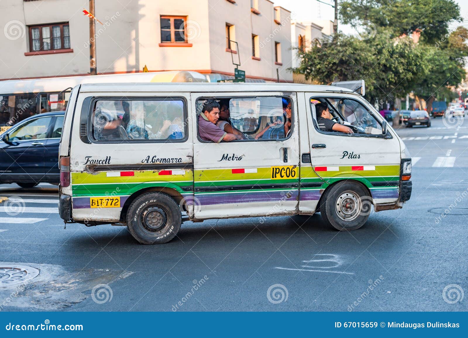 LIMA, PERU - APRIL 12, 2013: Old Vans Bus in Lima Street and Extremely Full of People. Faucett - Pilas Route. Editorial Stock Image - Image of driver, 67015659