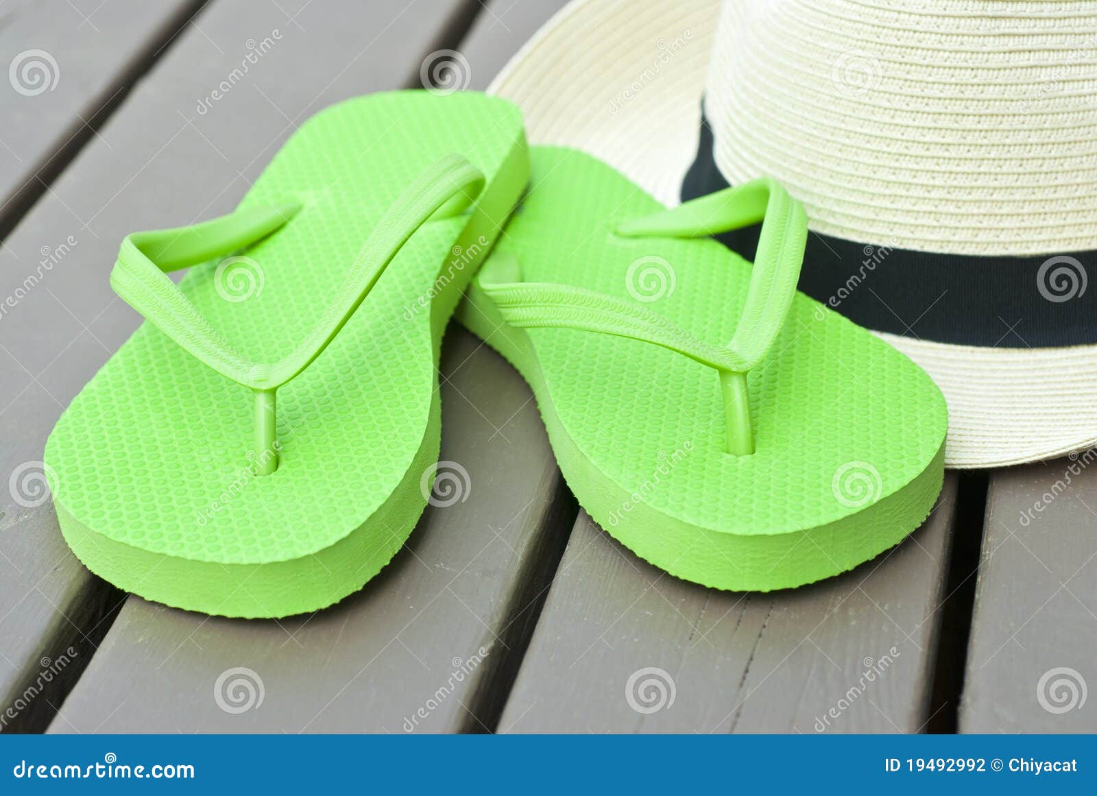 Lime Green Flip Flops stock photo 