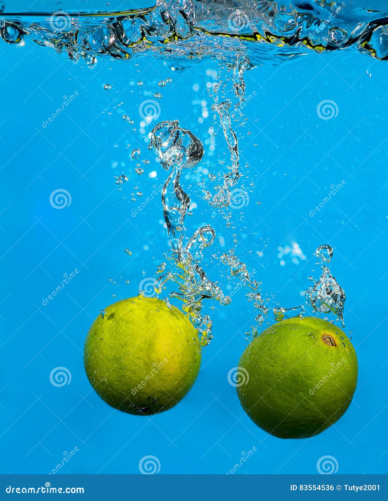Lime Splashing in Water on Blue Stock Photo - Image of healthy, action ...
