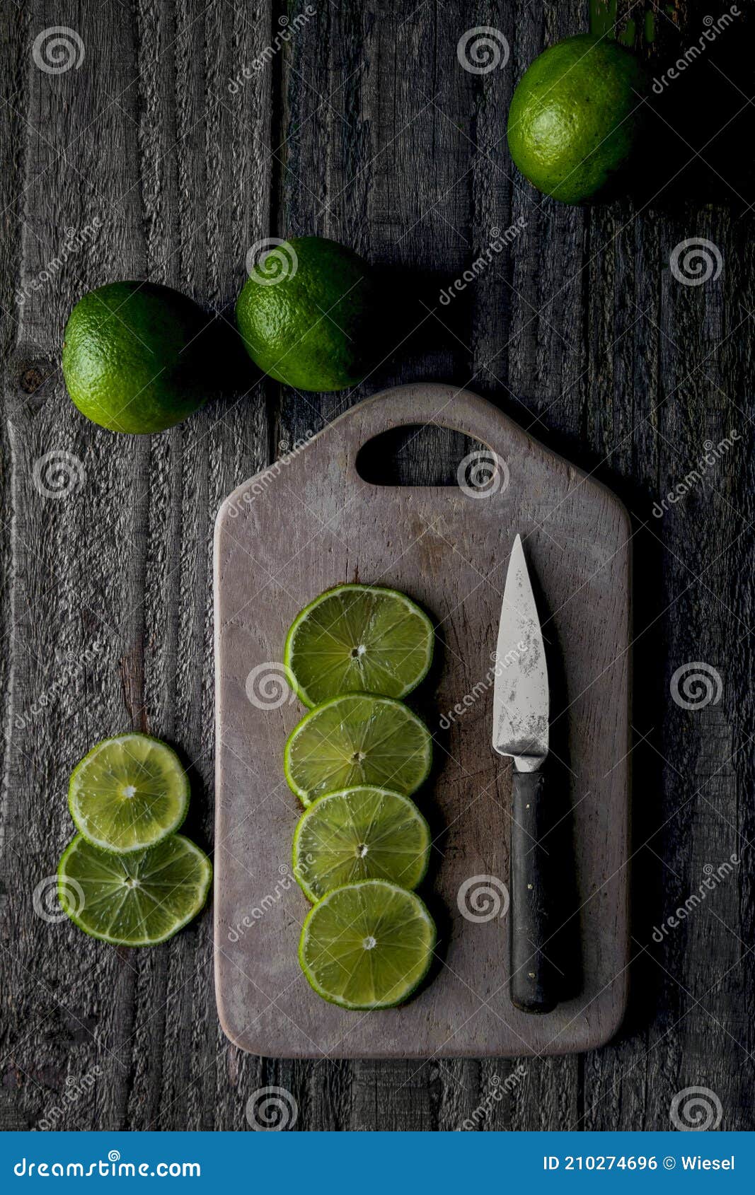 Limes Cut on a Wooden Board Stock Photo Image of background, studio