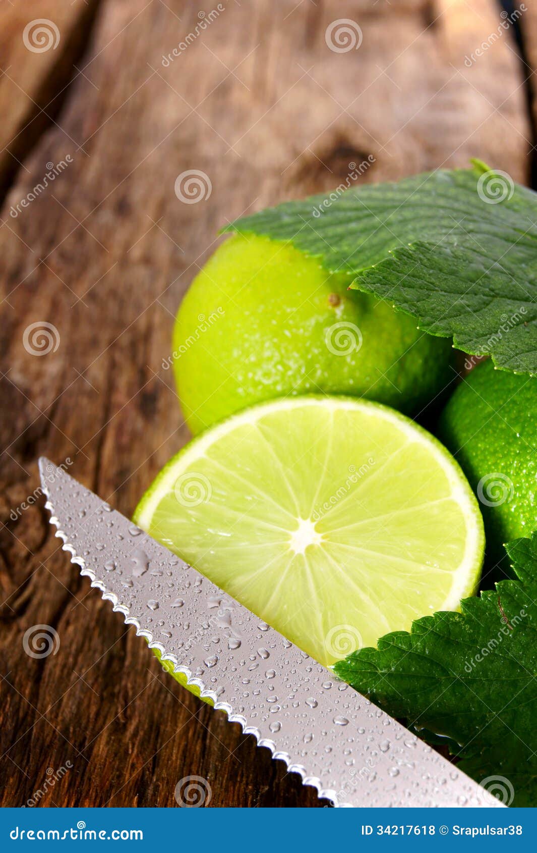 Limes and Knife. on Wooden Board. Stock Photo Image of health