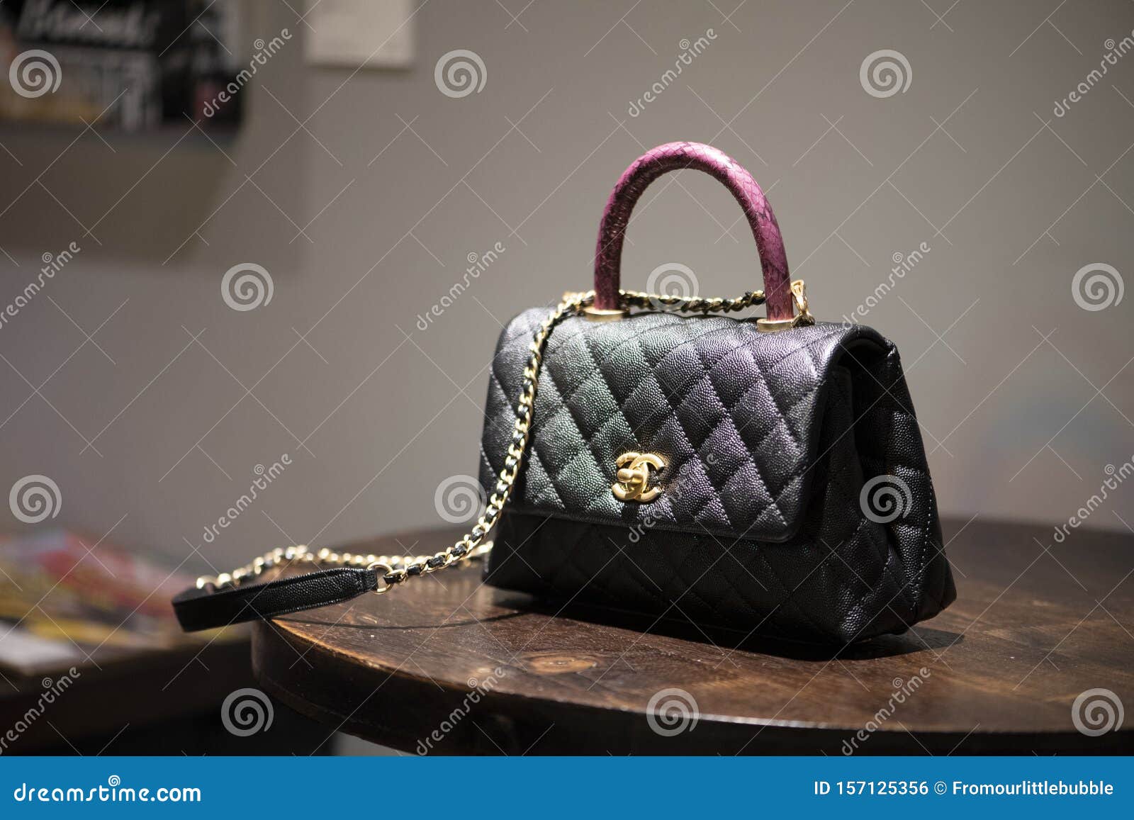 Limited Edition Chanel Bag on a Table Editorial Photo - Image of