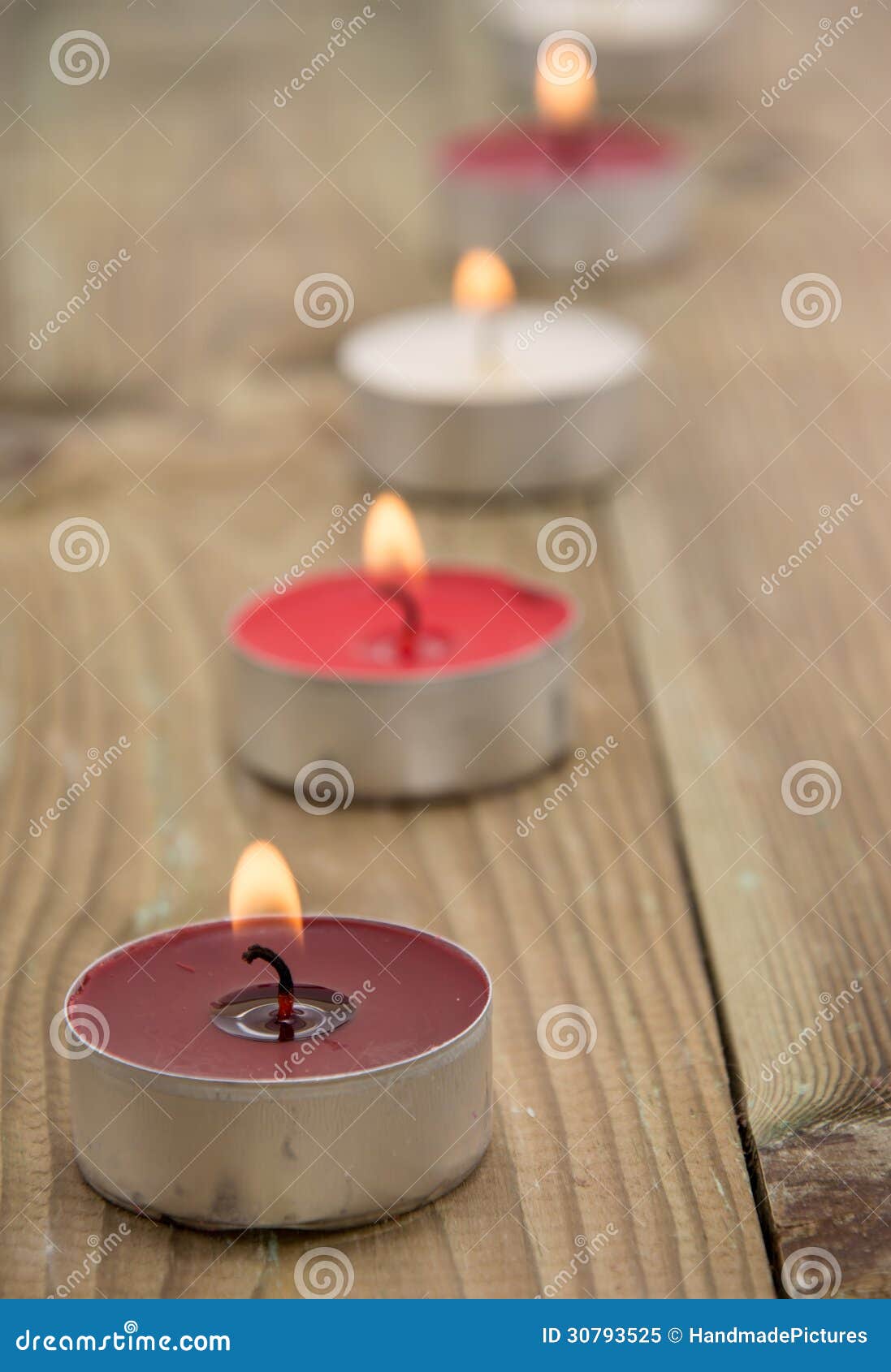 A Line of Burning Candles in Daylight Stock Image Image of burning