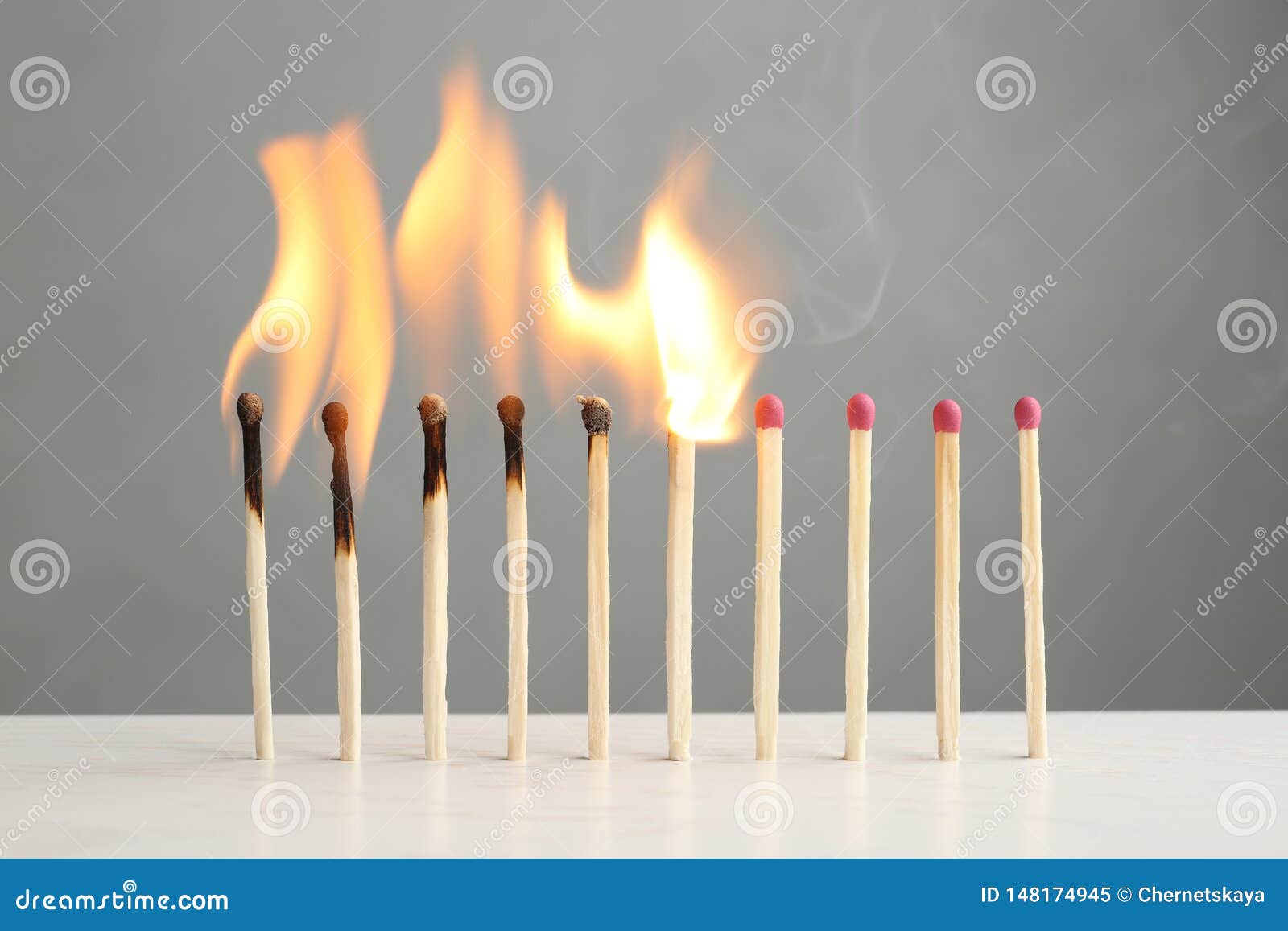 Line of Burning and Whole Matches on Table Stock Image Image of