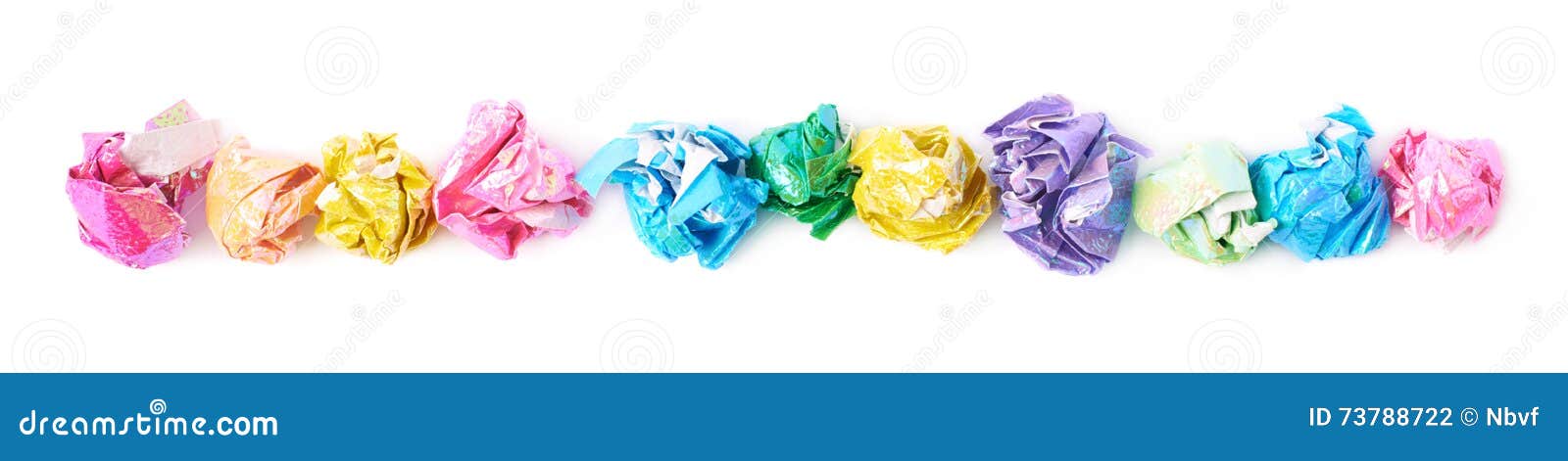 line of colorful crumbled paper balls 
