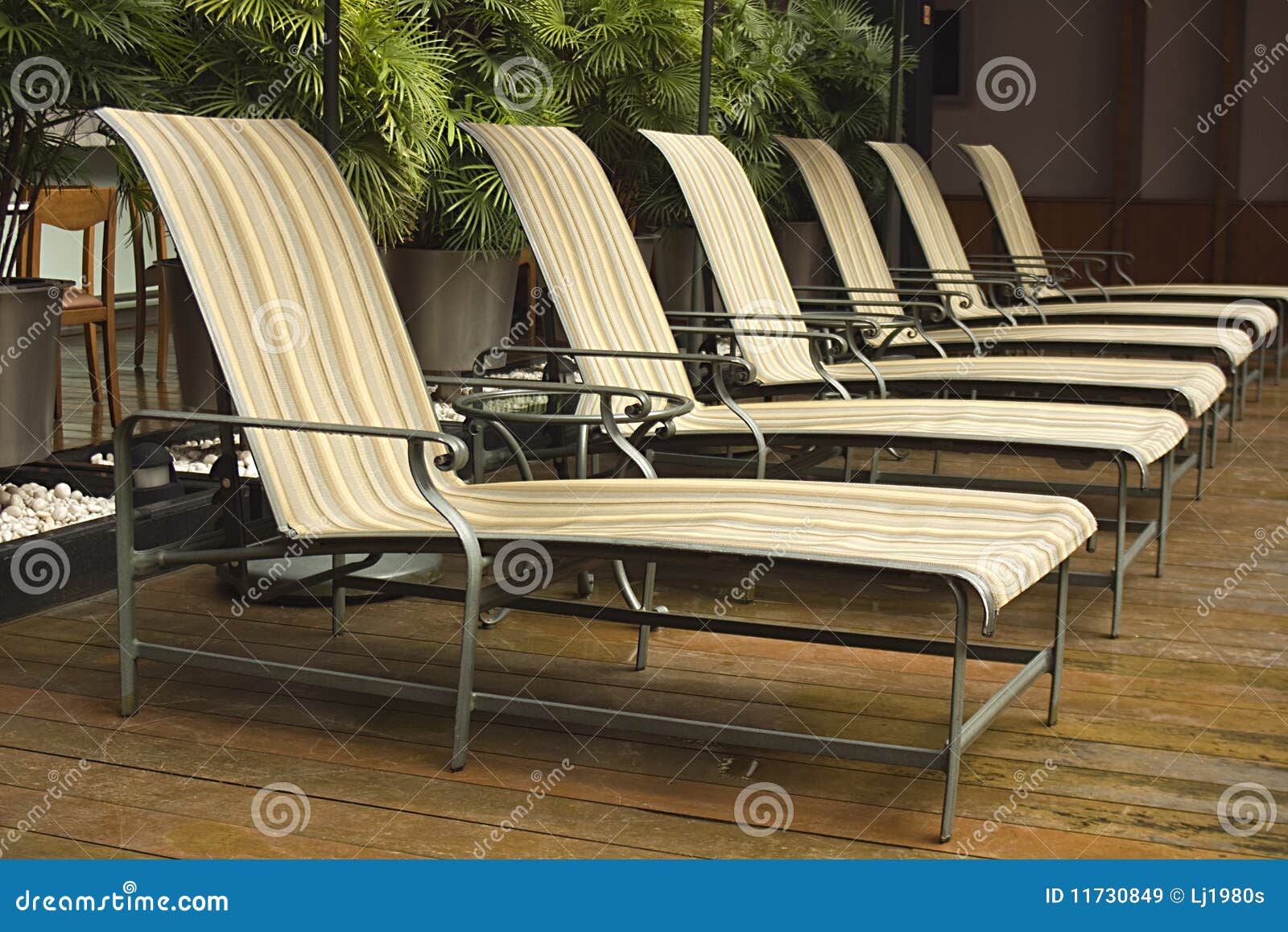 Line of Deck Chairs Around a Pool Area Stock Image Image of chairs, holiday 11730849
