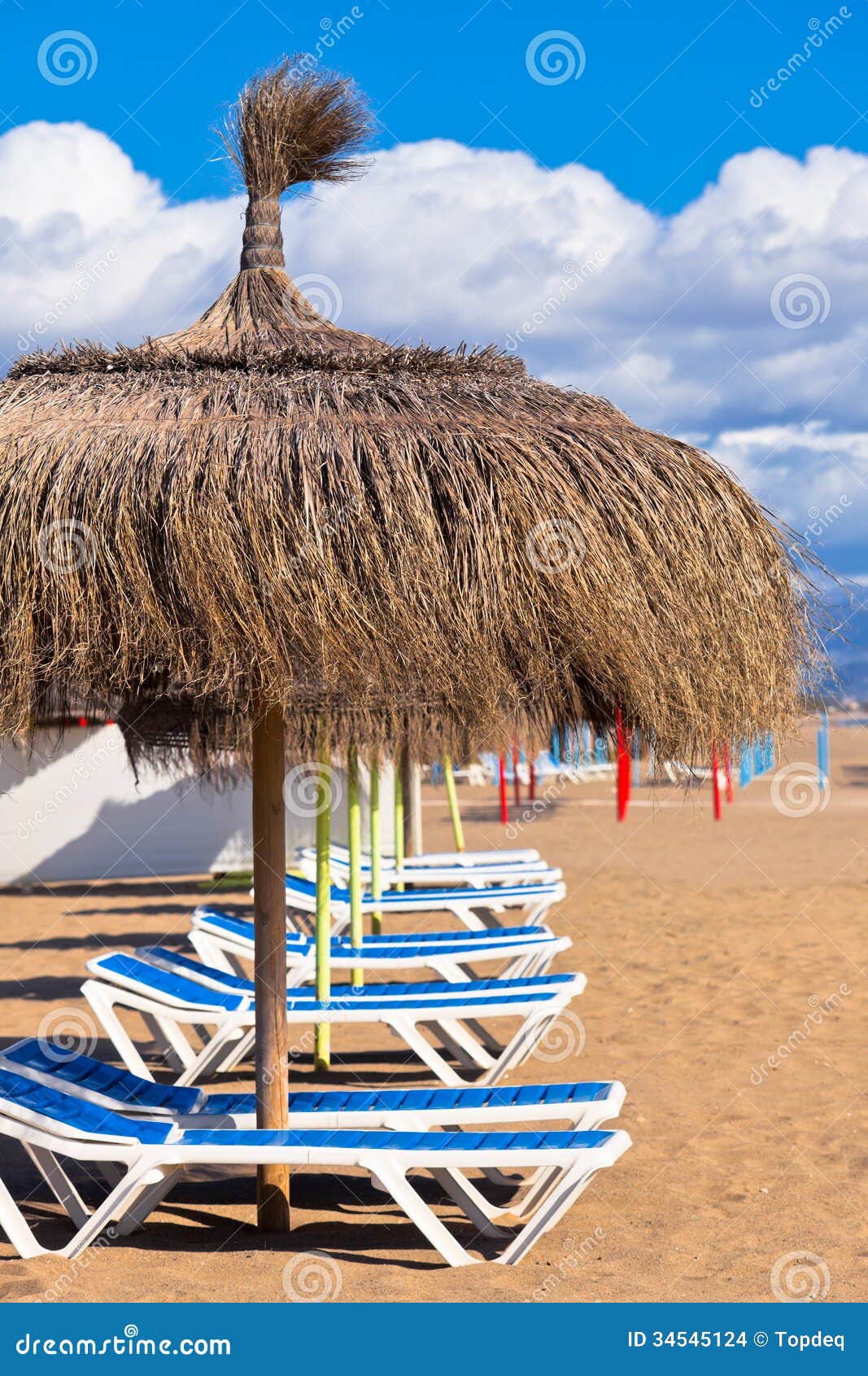 Line of Parasols at Spanish Sand Beach Stock Photo Image of