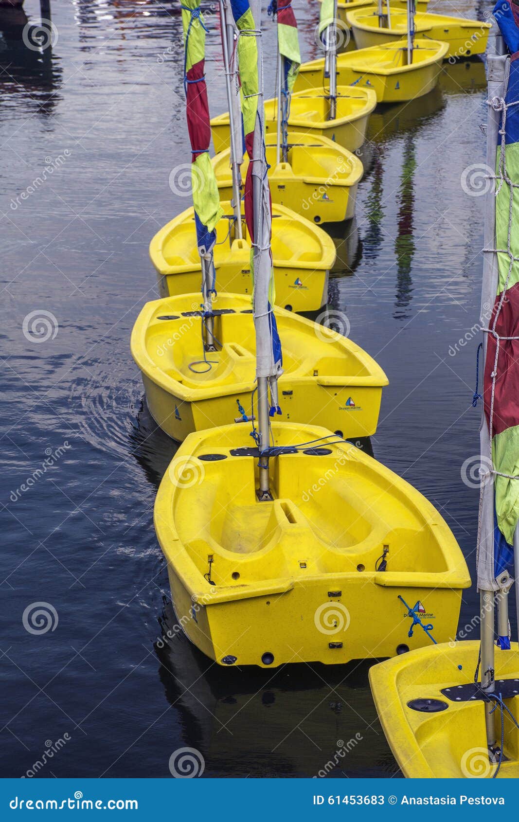 Line of Small Yellow Boats on the Water Stock Image Image of sail