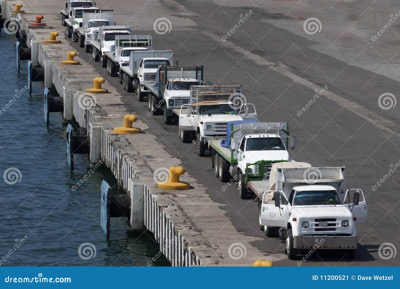 A line of trucks stock image. Image of transportation 11200521